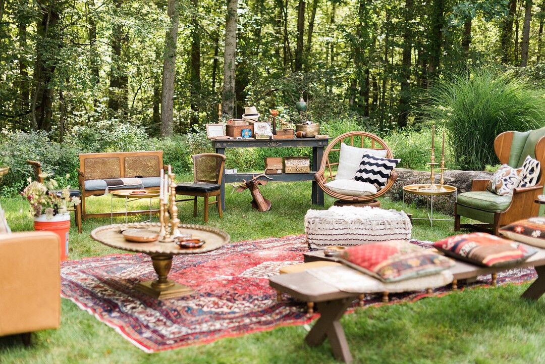 Eclectic, Bohemian Outdoor Lounge with Benches, Chairs and Rug