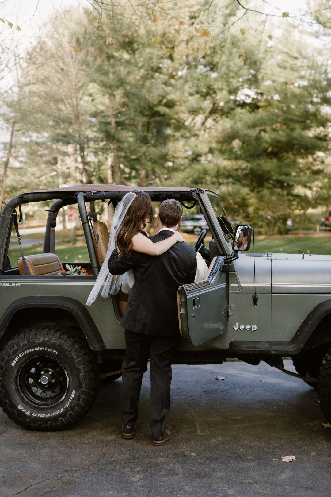 The Happy Couple Ready to Drive Off In Jeep Wrangler