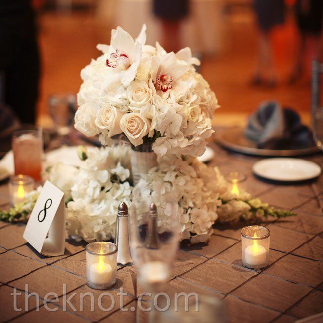 bridesmaids bouquets on head table