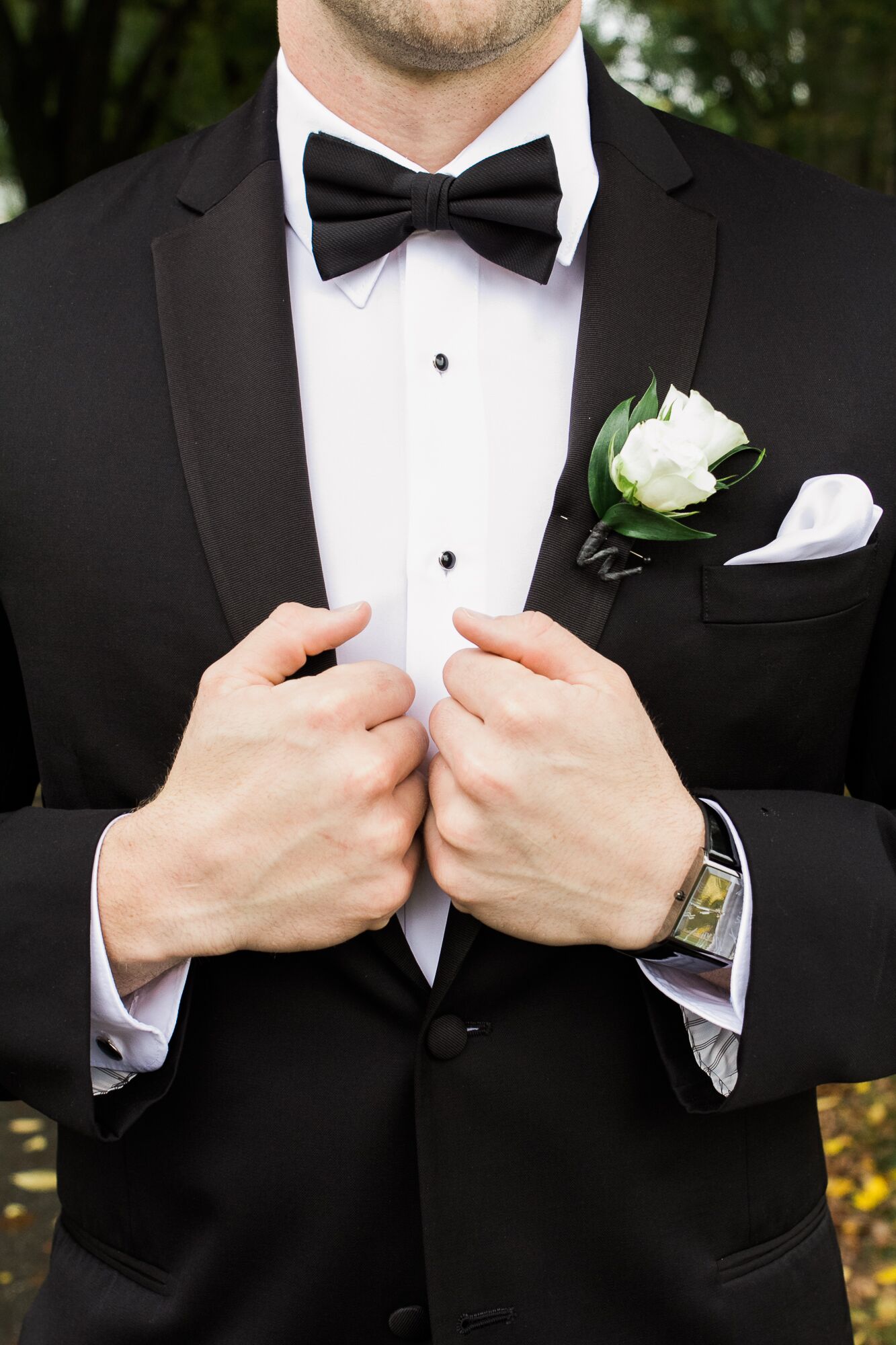 Black Tuxedo with White Rose Boutonniere