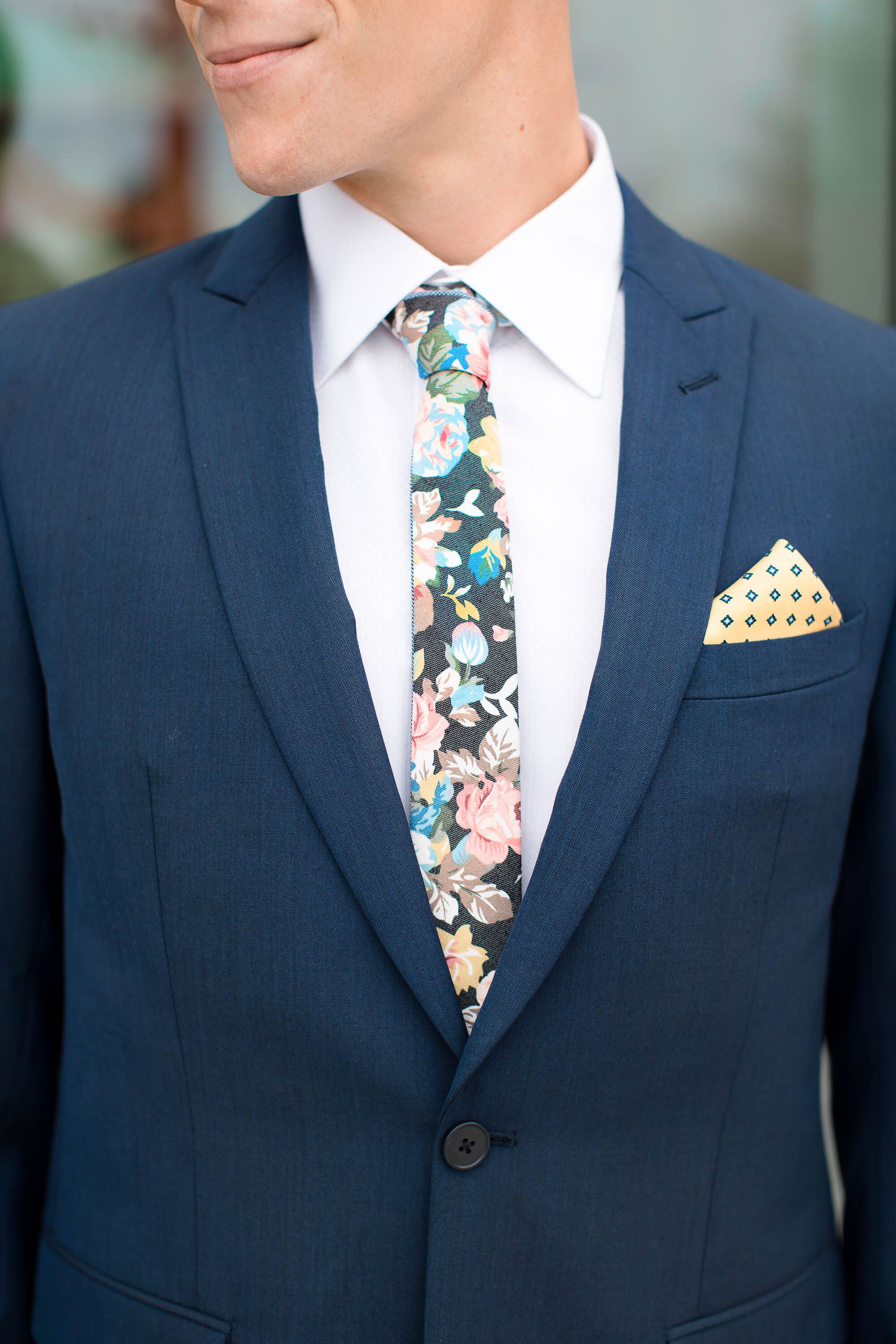 Navy Grooms Suit With Floral Tie