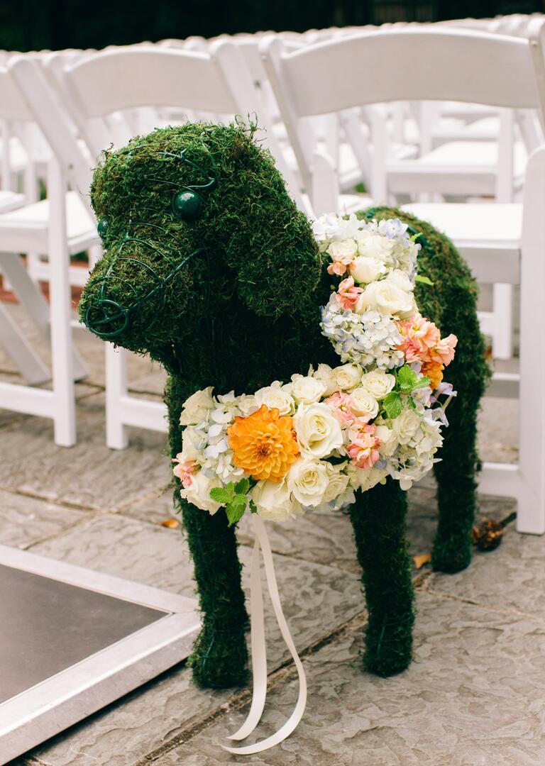 Life-size moss topiary of the couple's dog