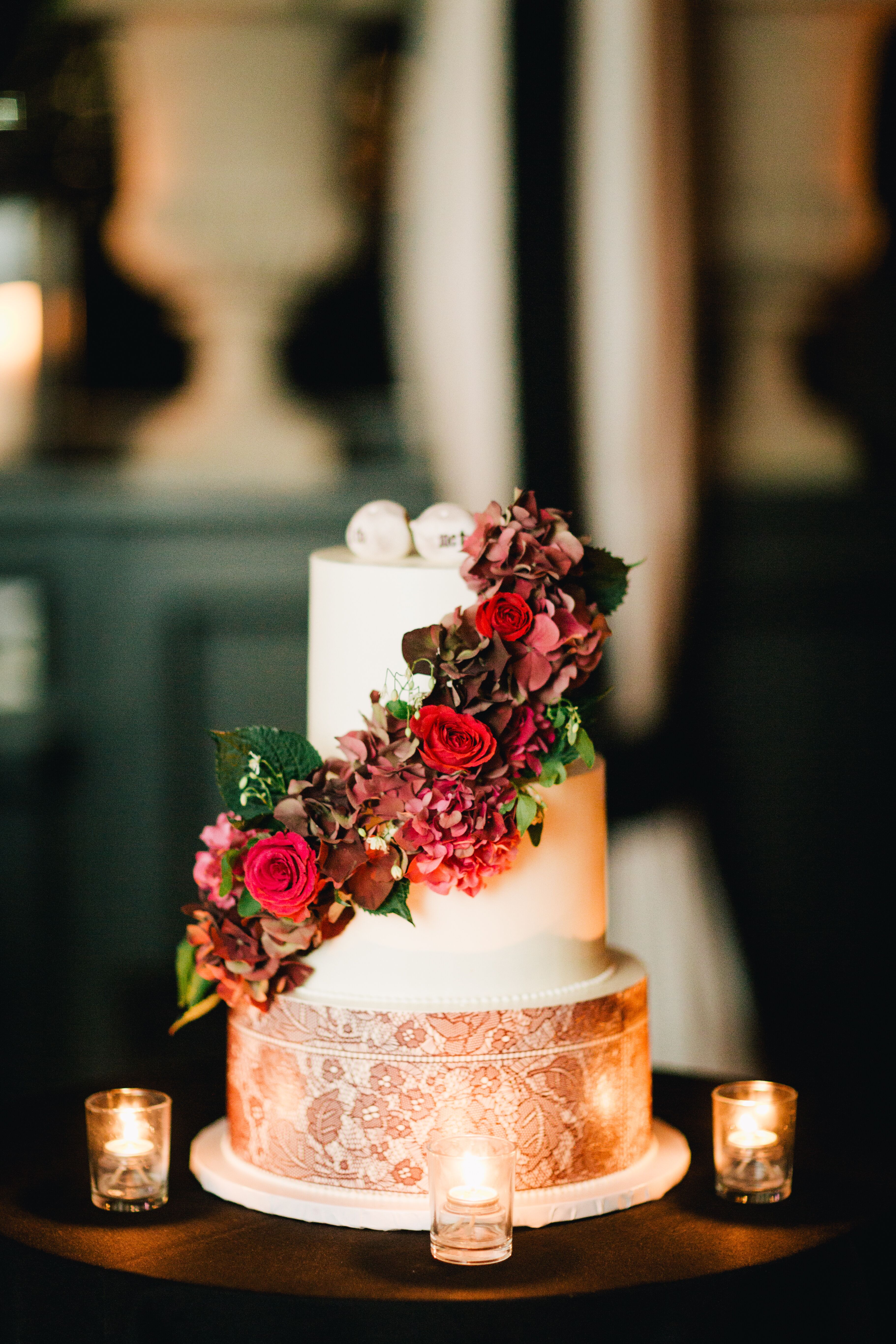 Lace Wedding Cake With Burgundy Flowers