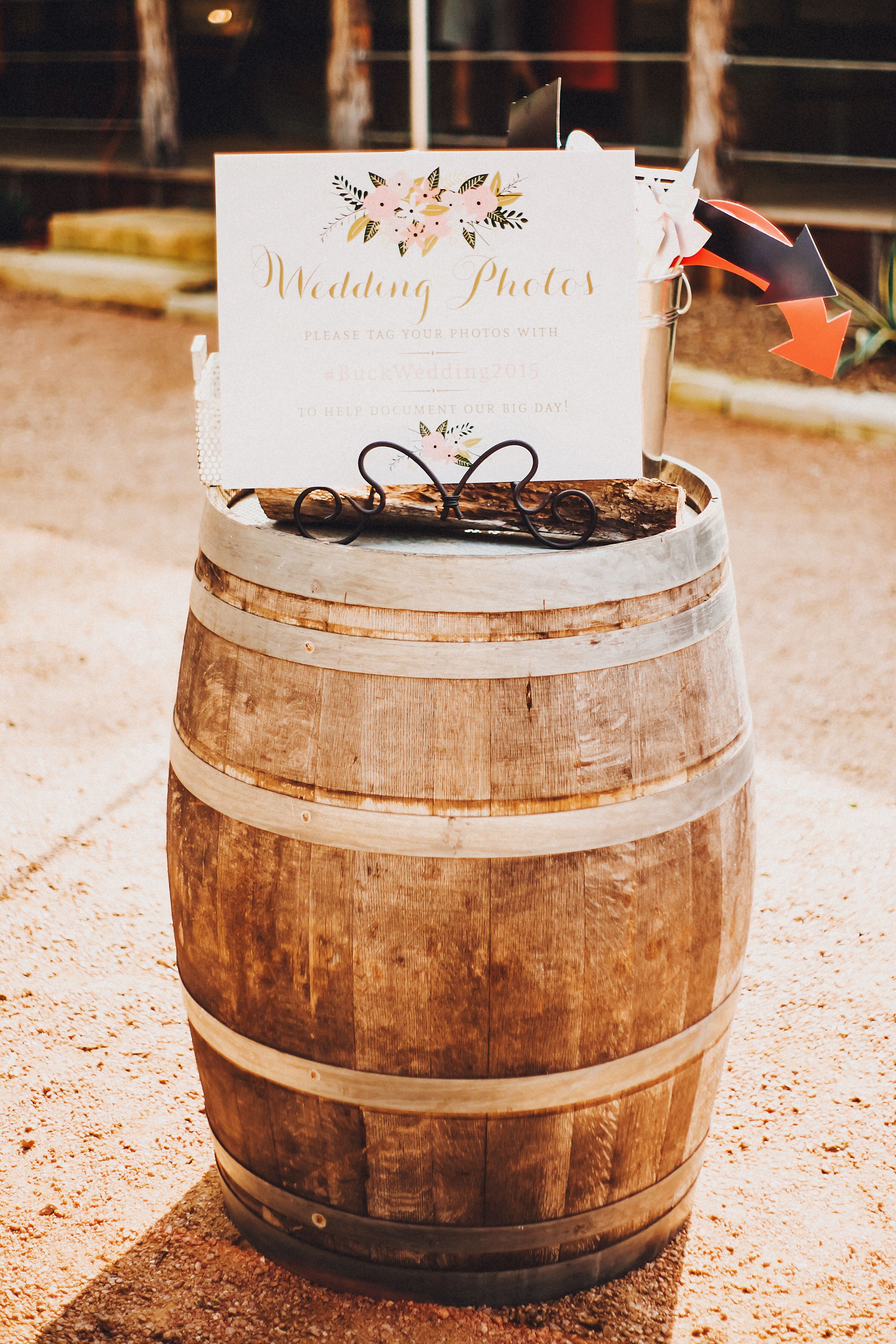 Elegant Photo Booth Sign on Wooden Barrels