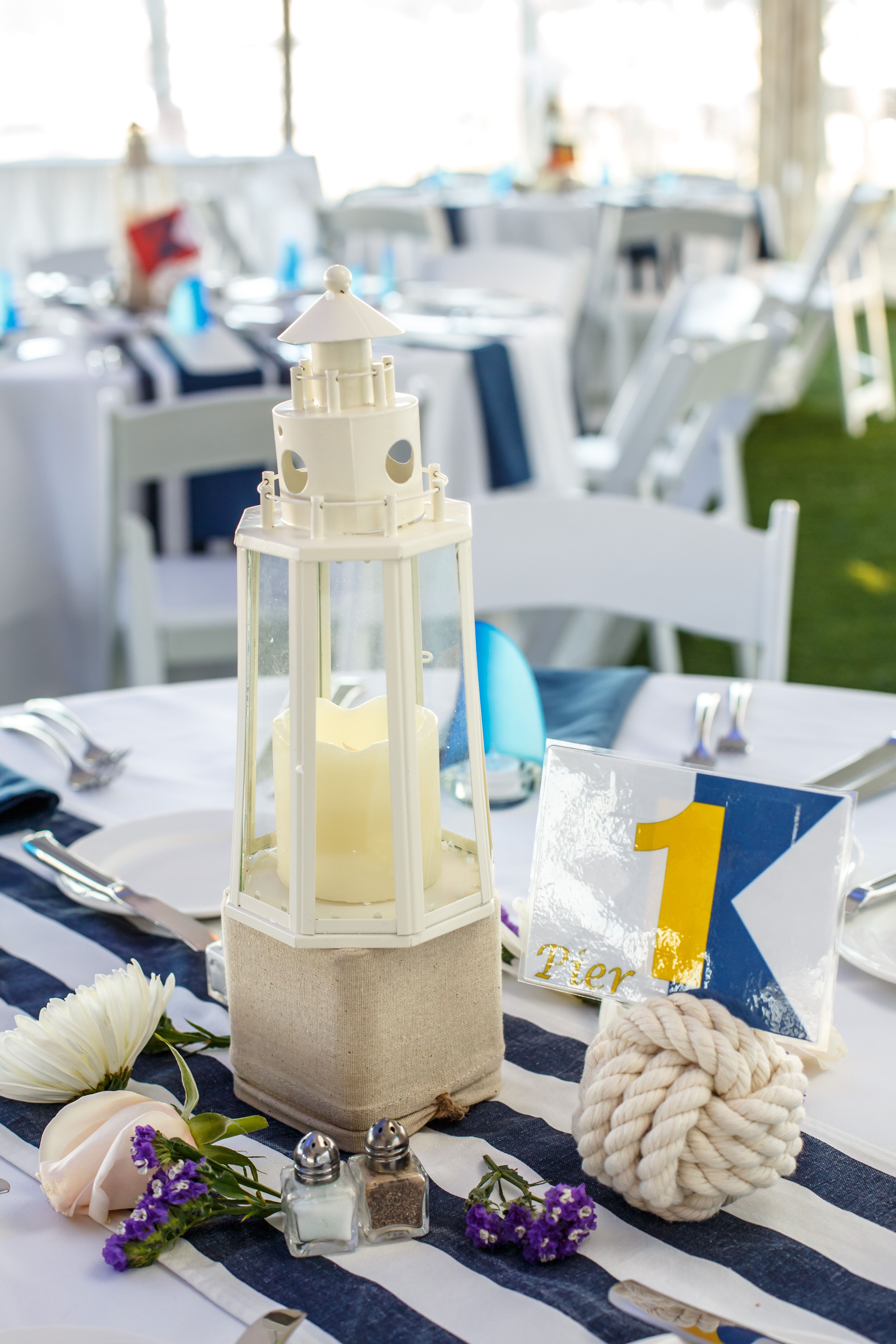 Nautical Centerpieces with Lighthouses and Monkey's Fist Rope Table Numbers