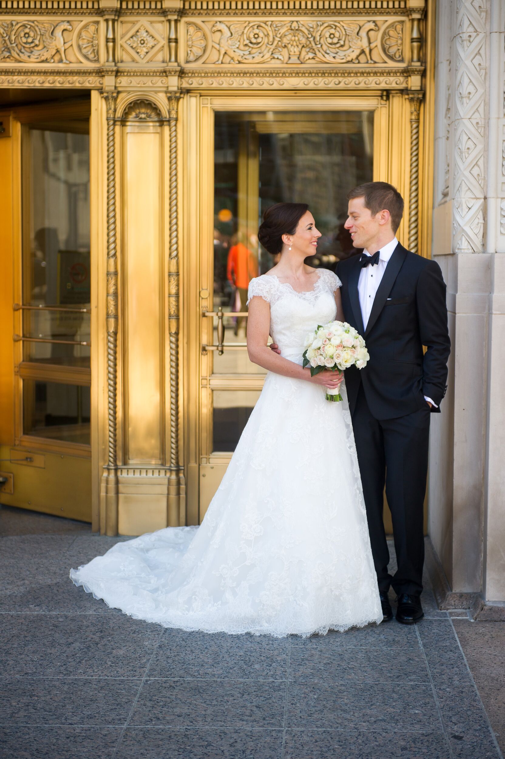 Wedding dress shop groom and bride