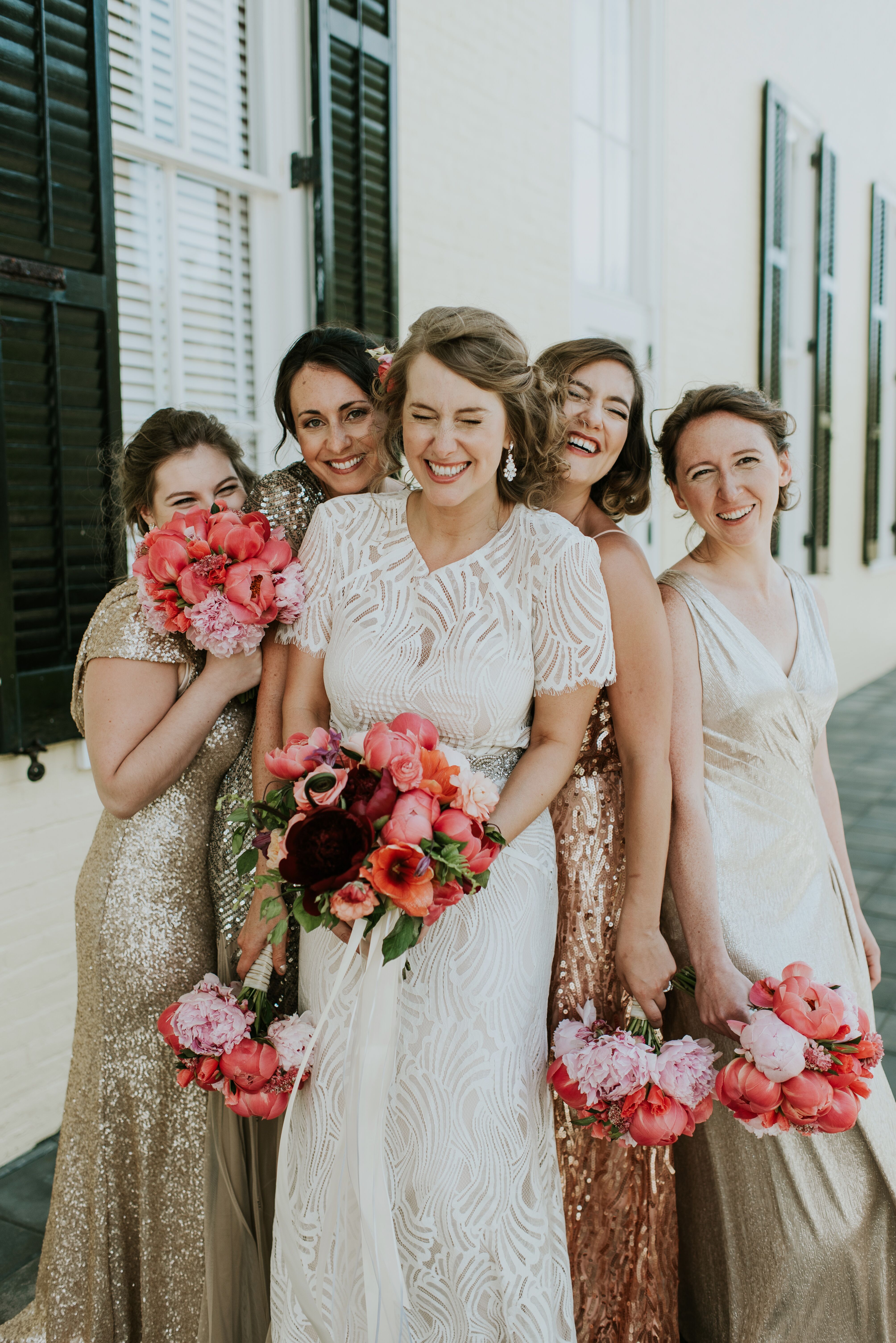 The Bride and Bridesmaids Carried Pink and Peach Peonies, Roses and Dahlias