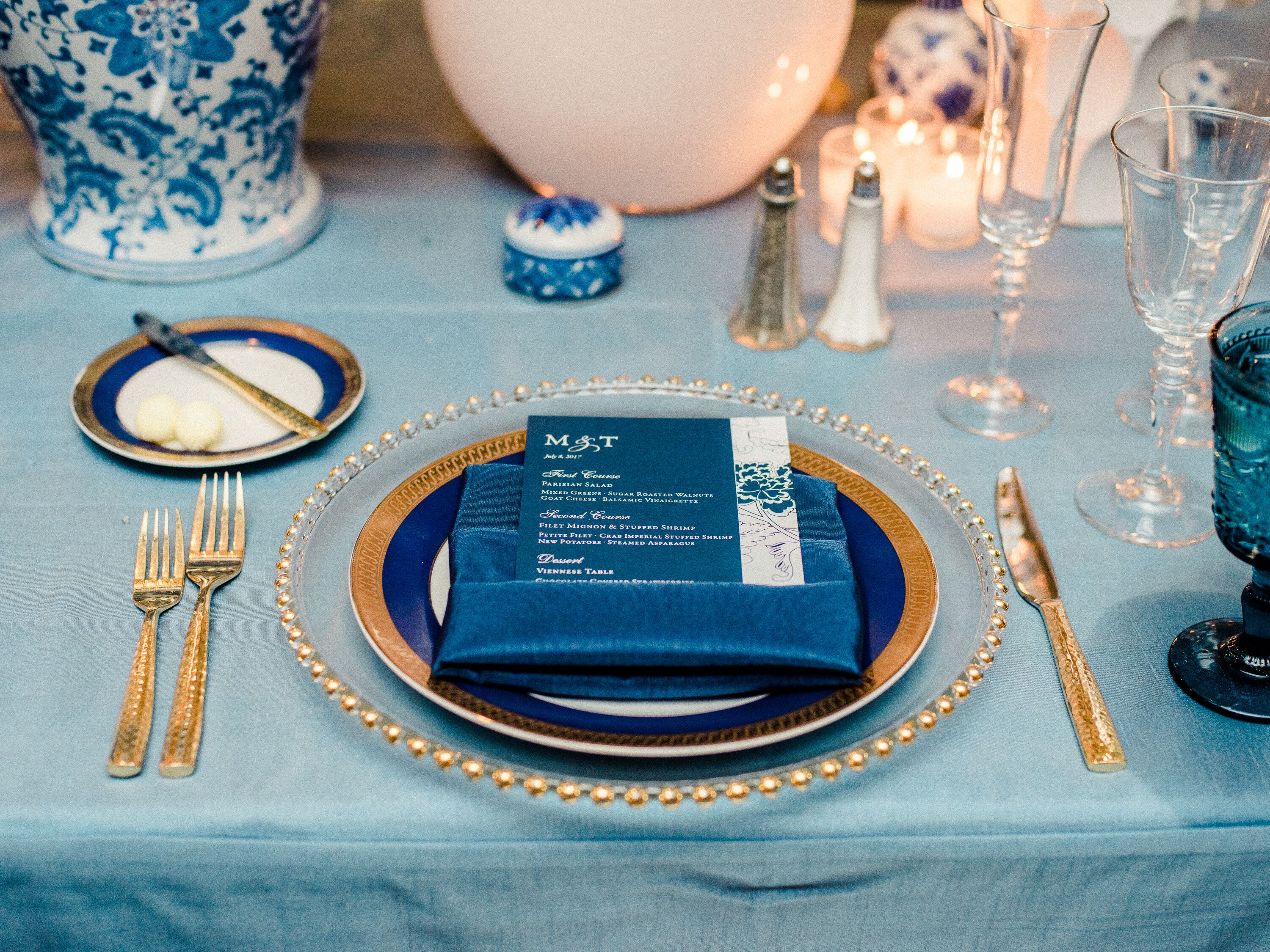 Elegant Place Settings with Blue and Metallic Details