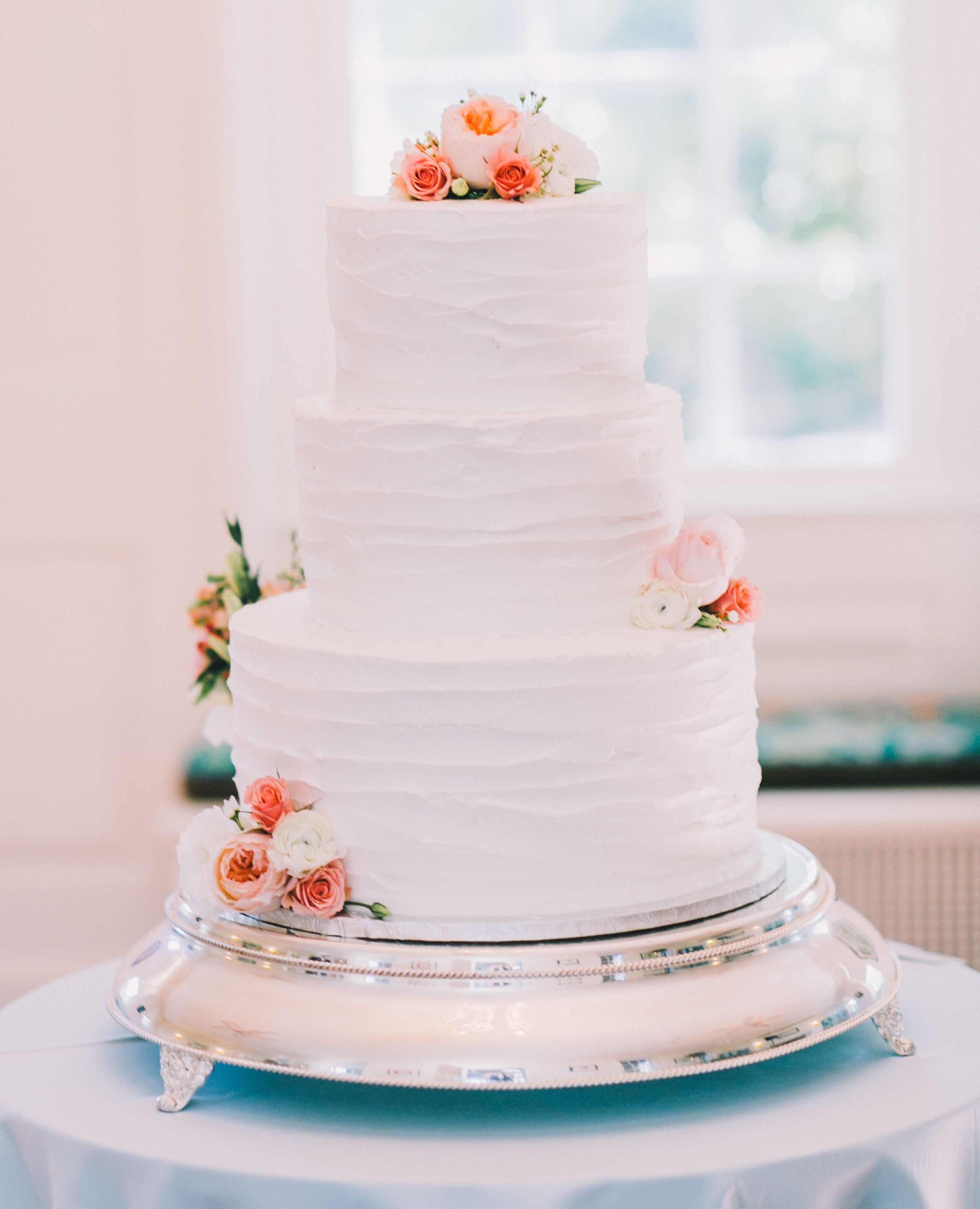 Buttercream Wedding Cake With Strawberry and Vanilla Mousse Filling