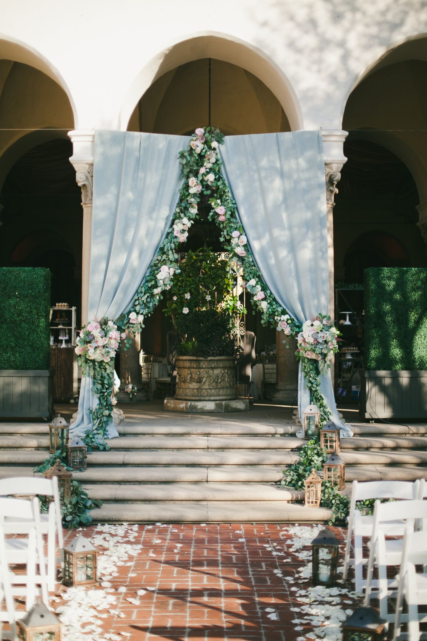 Wedding Altar With Anemone Garland and Lanterns