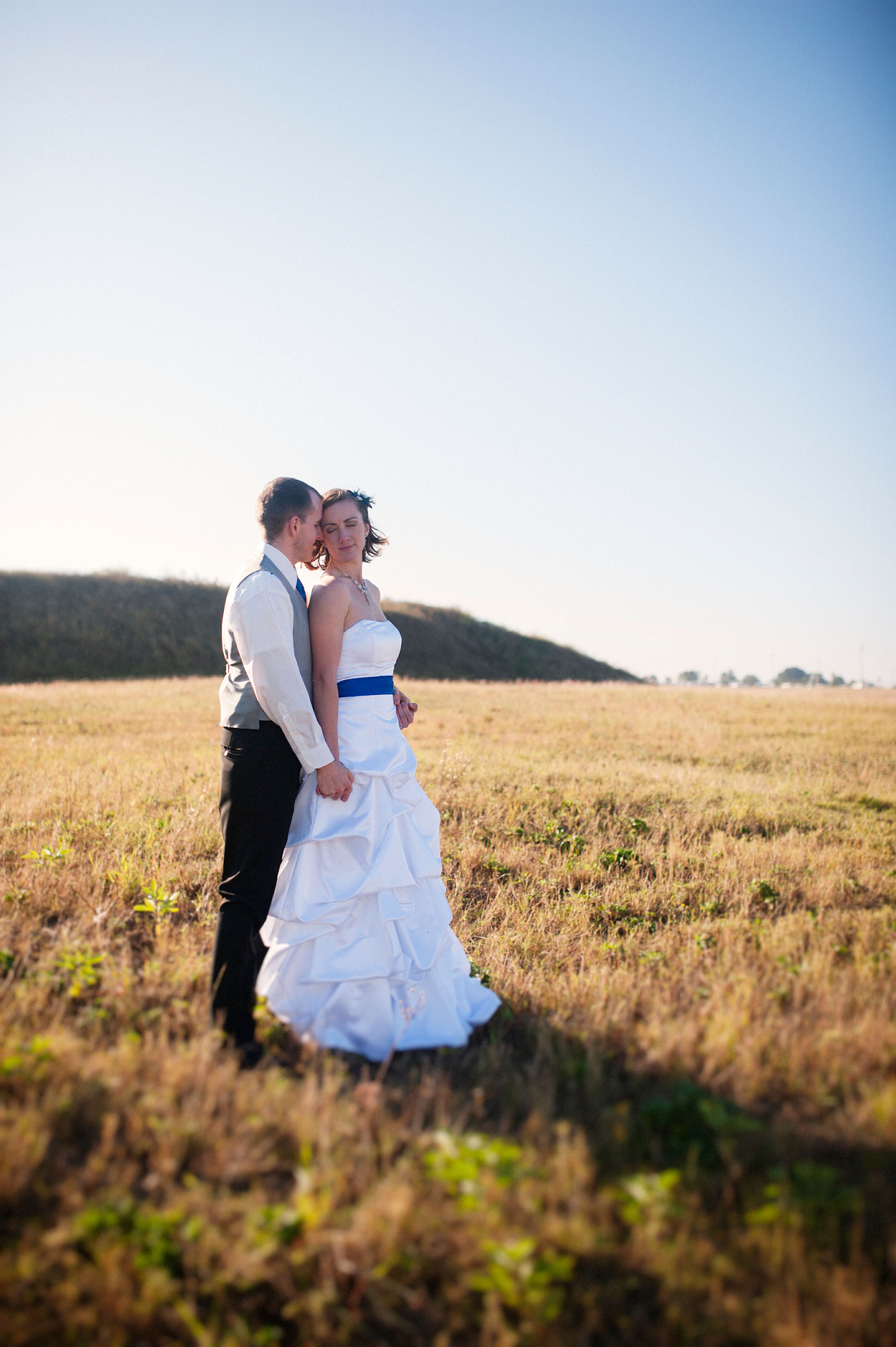 Wedding dress with blue sash sale