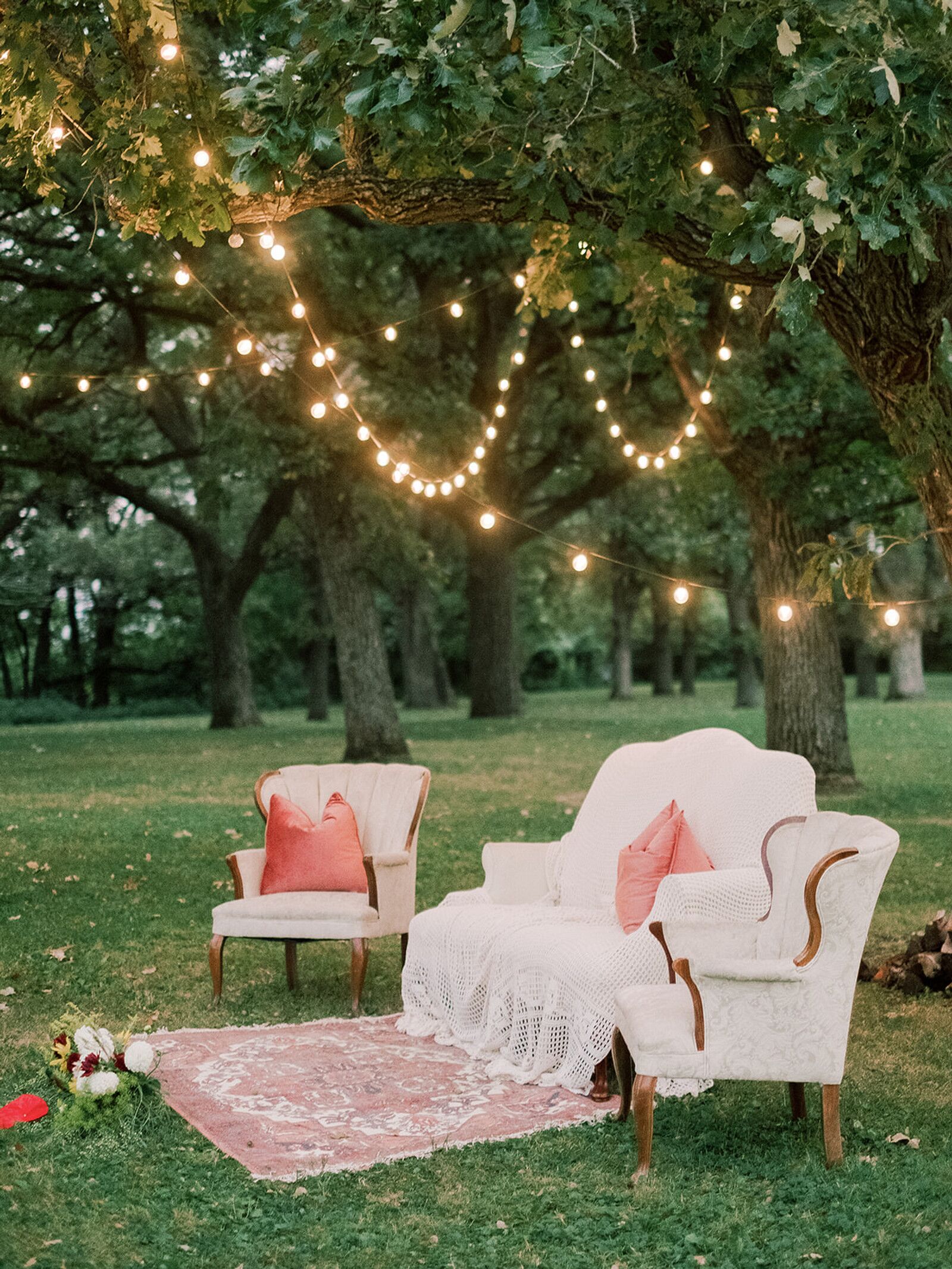 Lounge Area Under Light-Filled Tree Grove