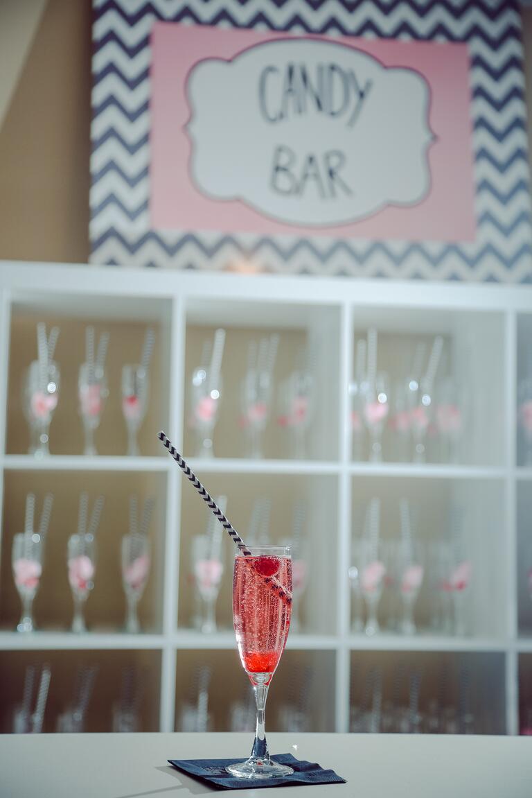 Pink signature cocktail with cotton candy