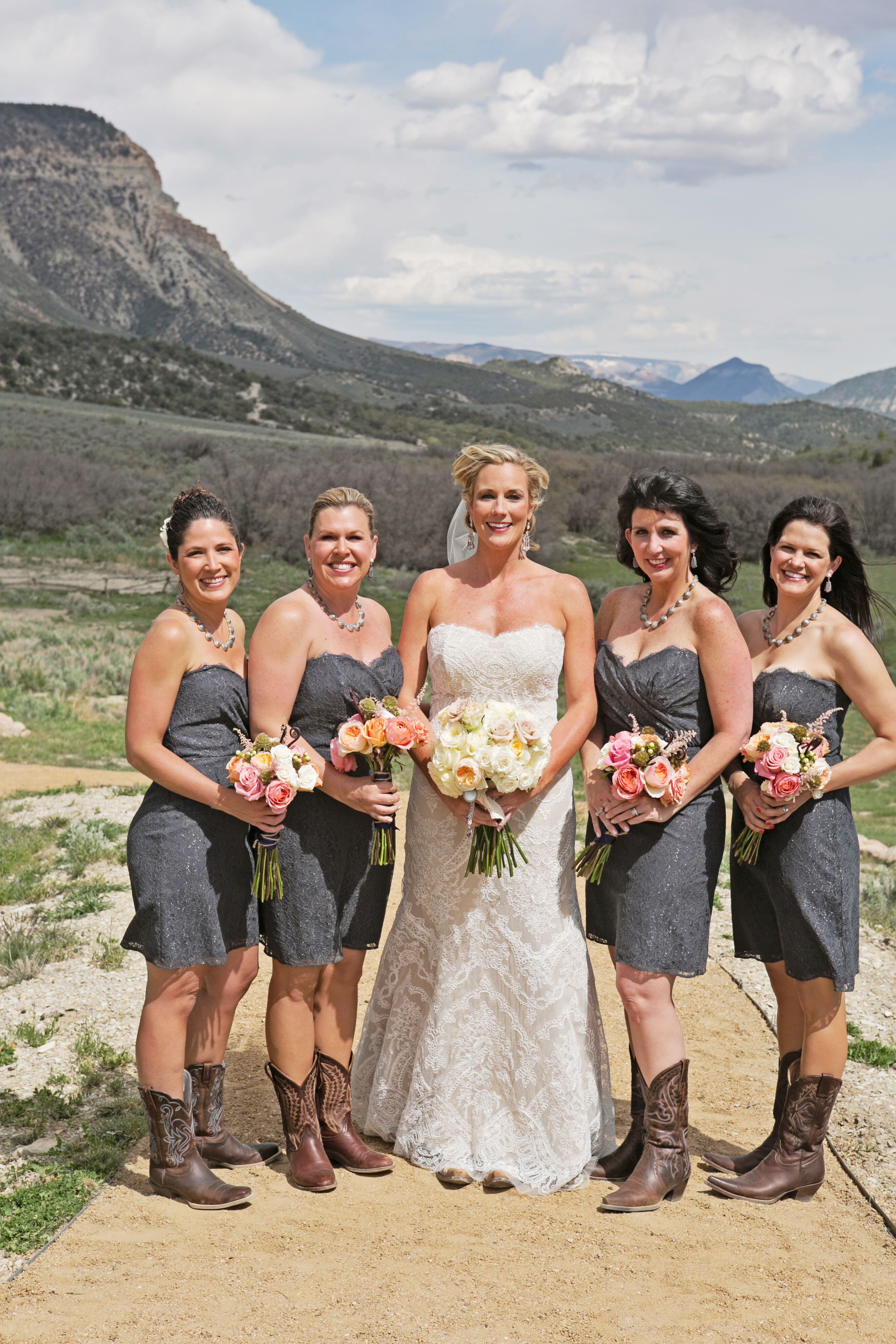 long bridesmaid dress with cowboy boots