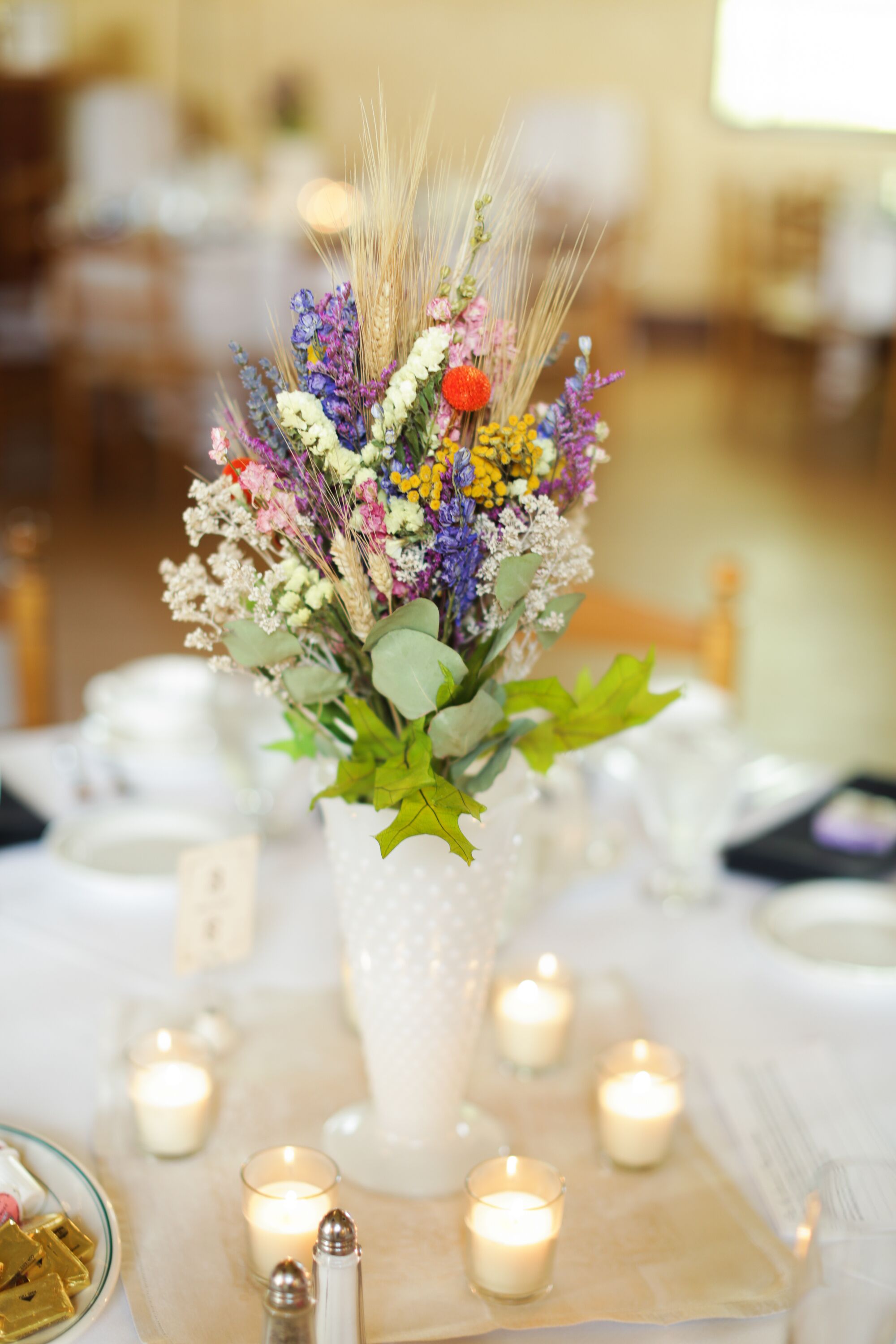 Dried Wildflowers In Milk Glass Vase Centerpiece