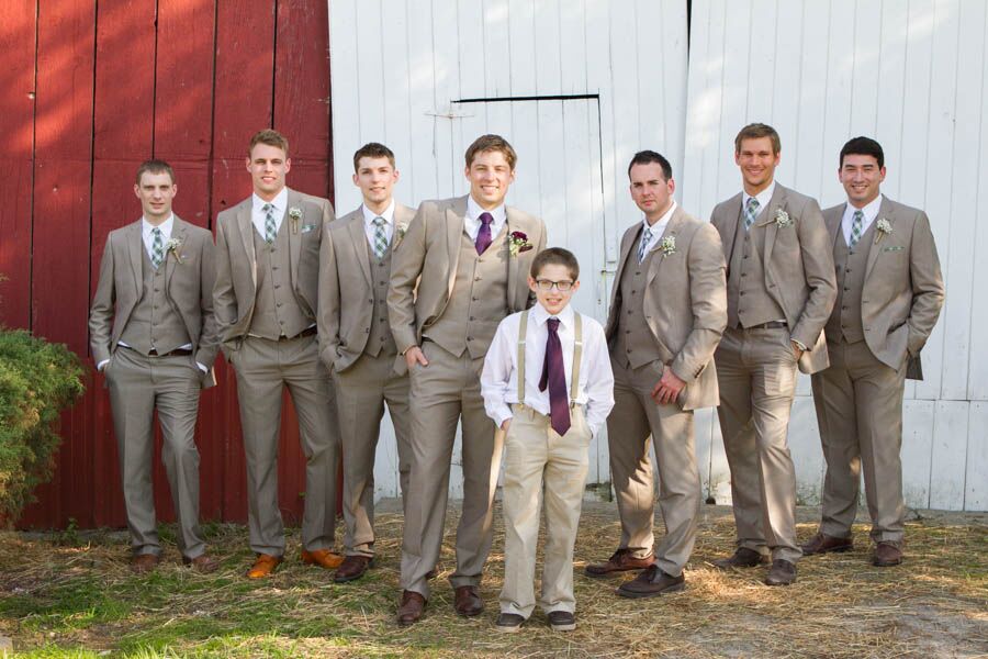 Groom and His Groomsmen Dressed in Tan Suits