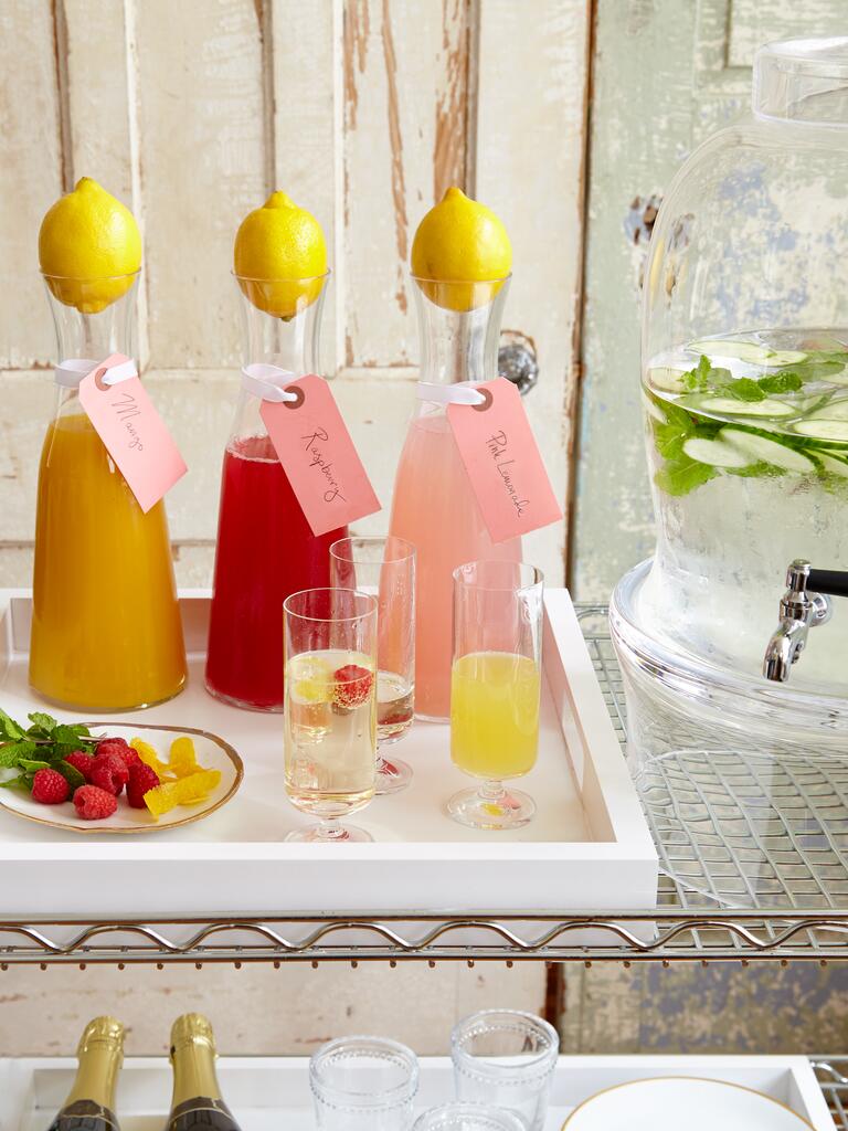 DIY champagne bar with carafes of juice