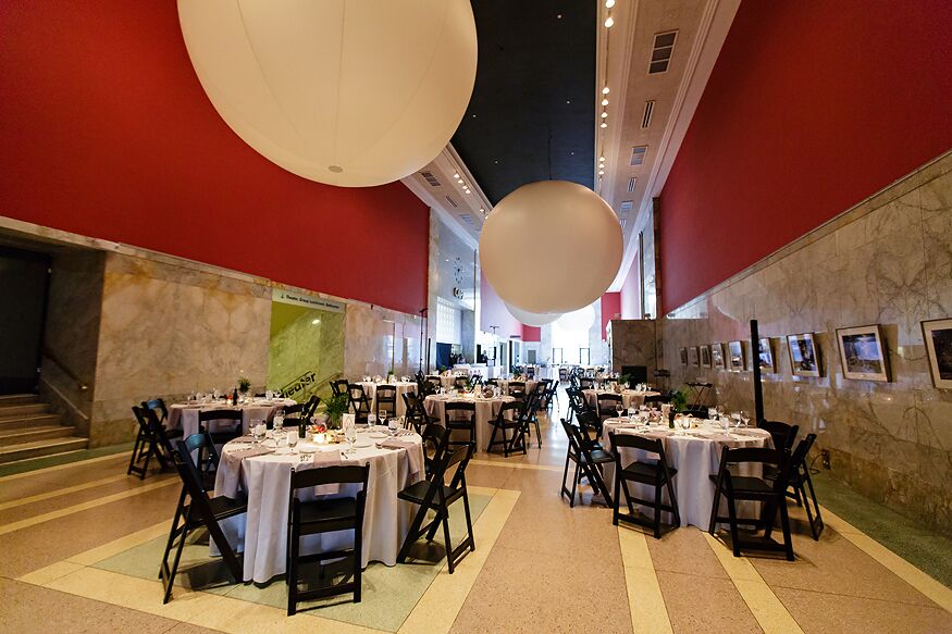 Red Reception Space With White Circular Lights