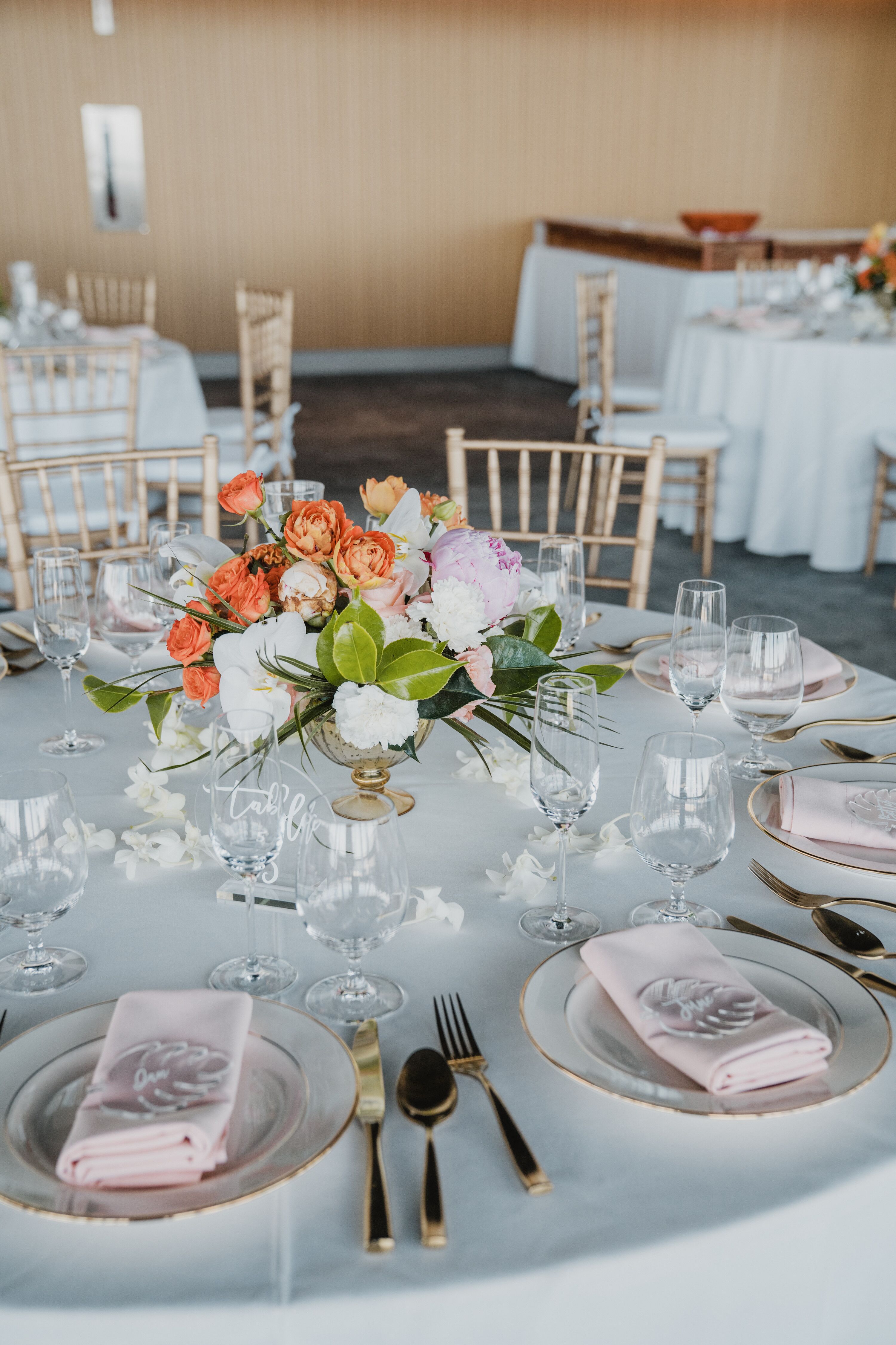 Classic Tablescape With Orange Centerpiece at Chase Center Wedding in ...