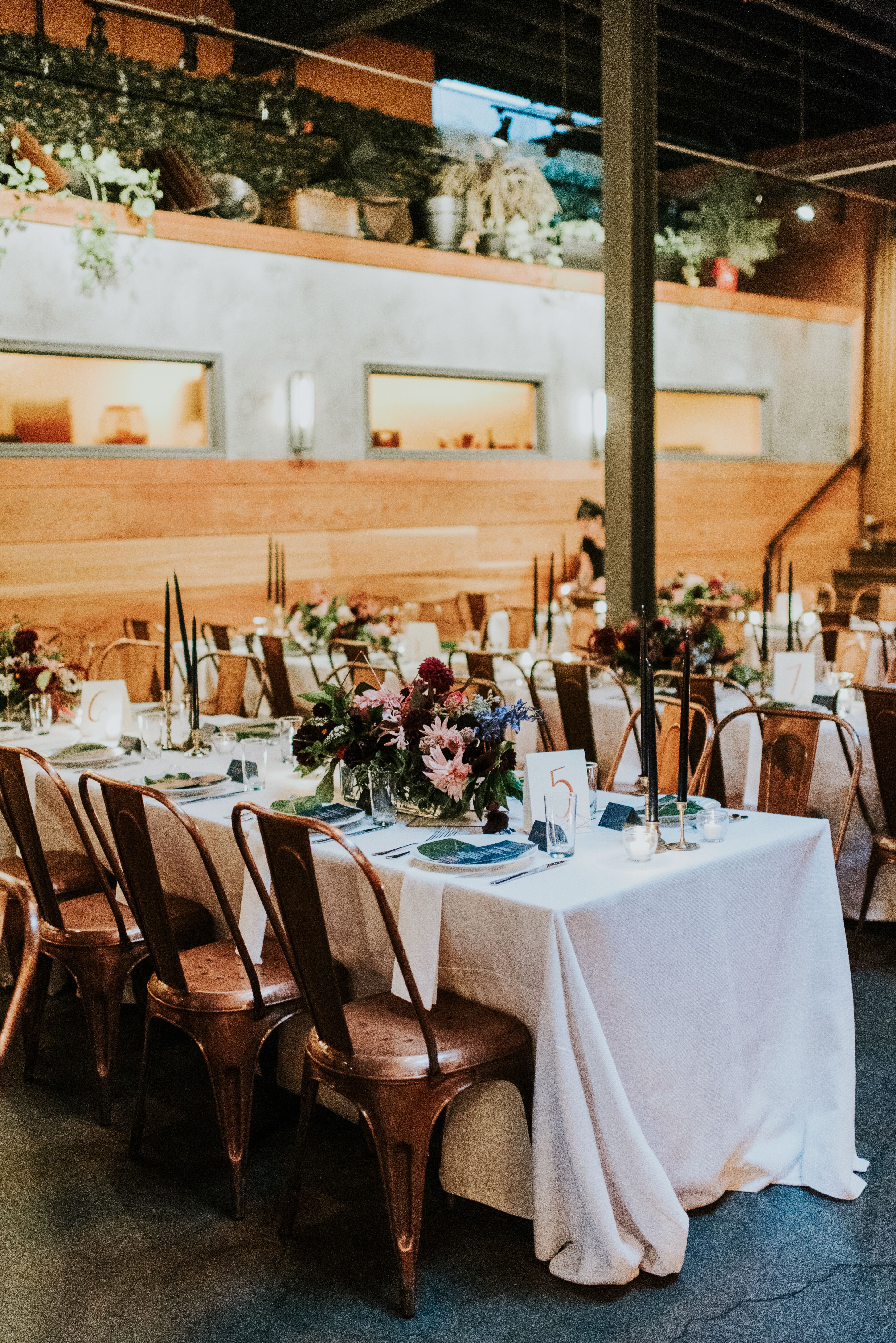 Elegant Bohemian Centerpieces and Copper Pilot Chairs