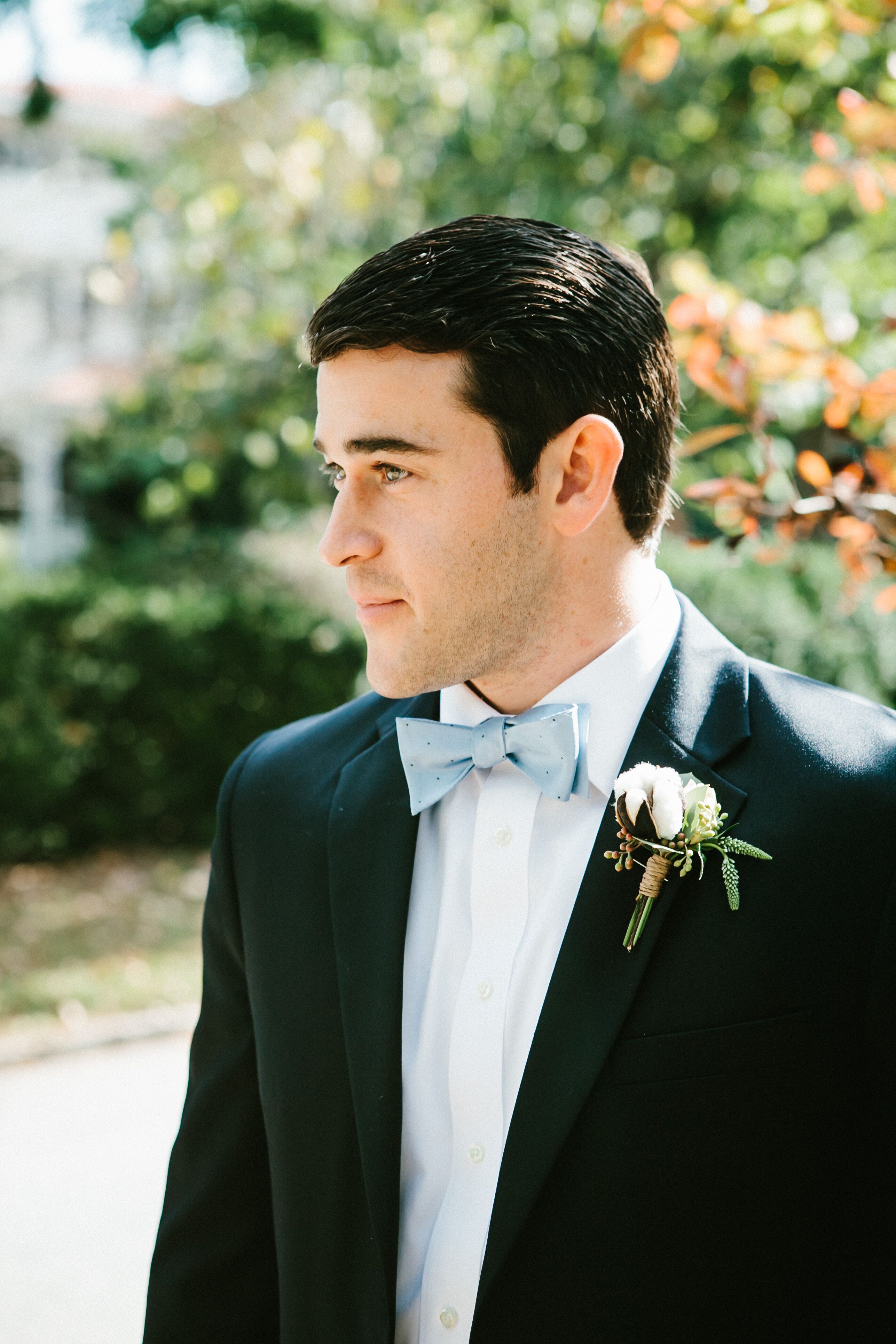 Groom in a Baby Blue Bow Tie and Cotton Boutonniere