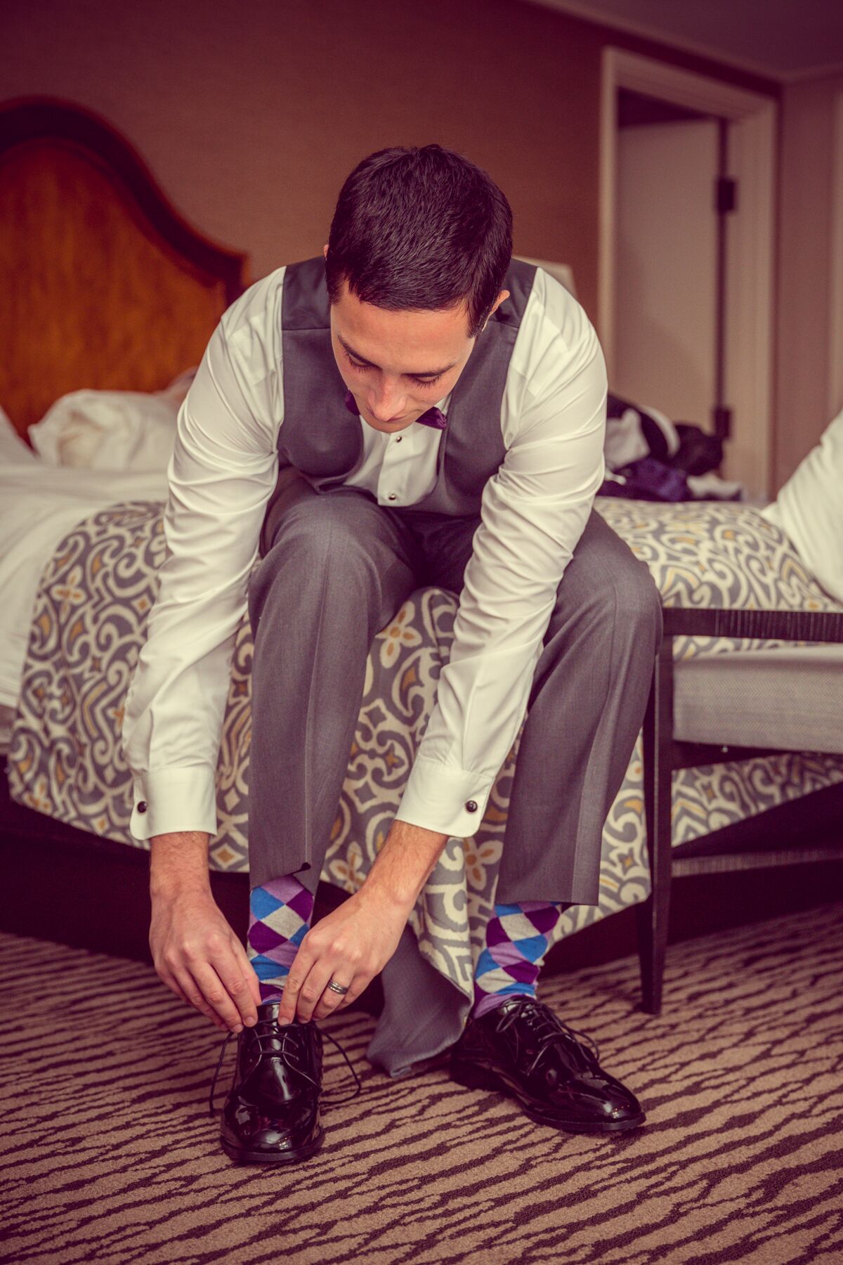 Groom Getting Ready in His Gray Suit