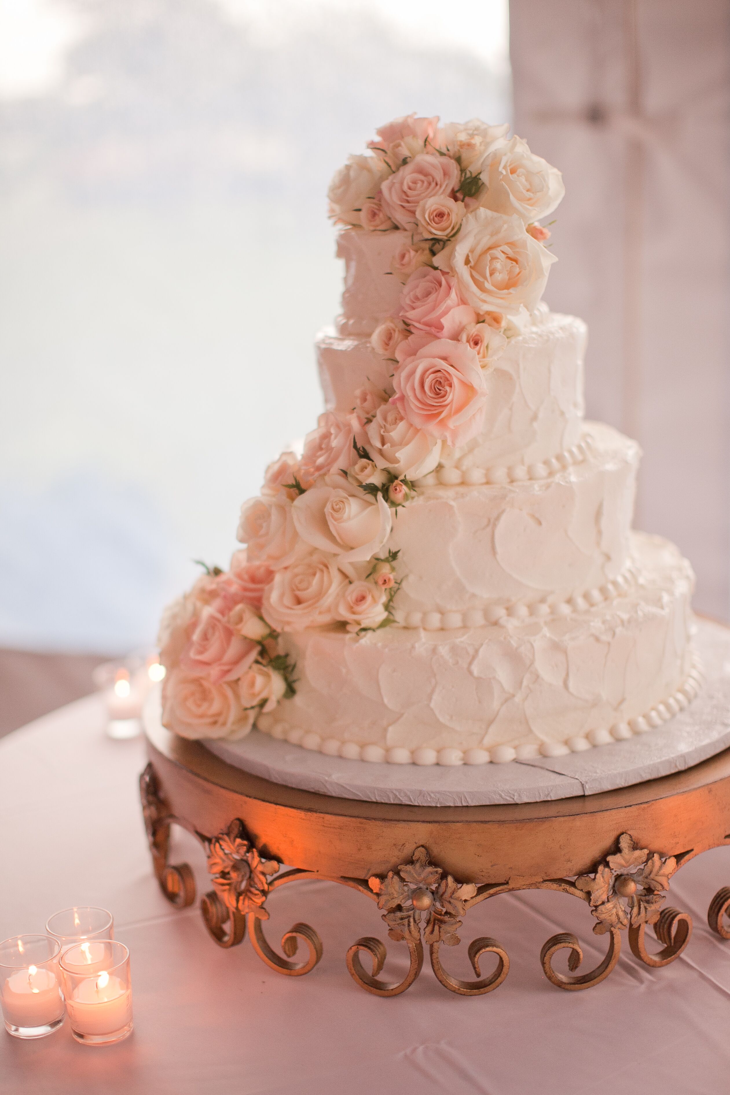 Four Tier Wedding Cake With Blush Roses 