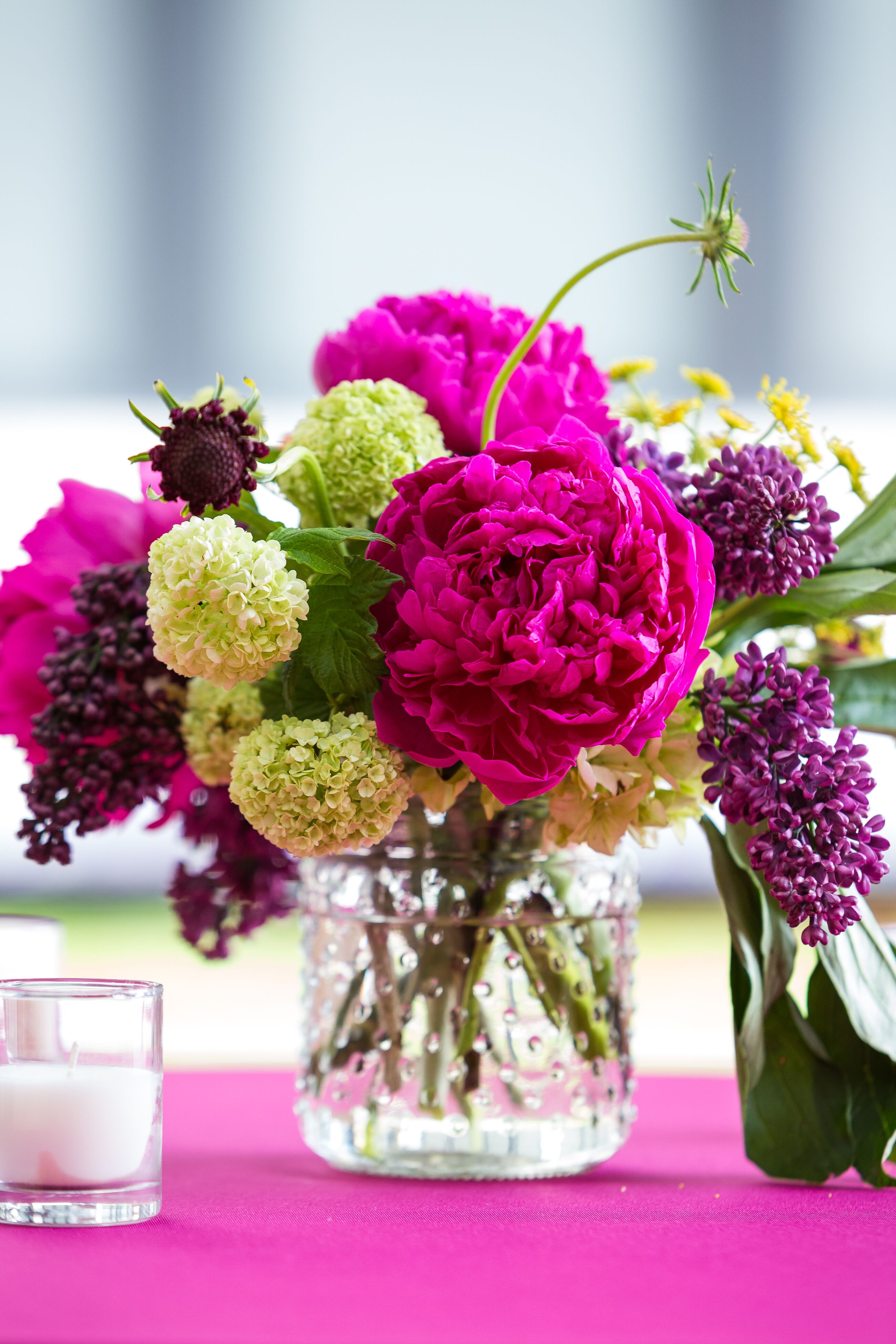 A Hobnail Vase Centerpiece with Pink Peonies and Hydrangeas