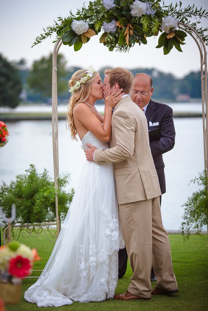 Waterside Wedding Ceremony First Kiss