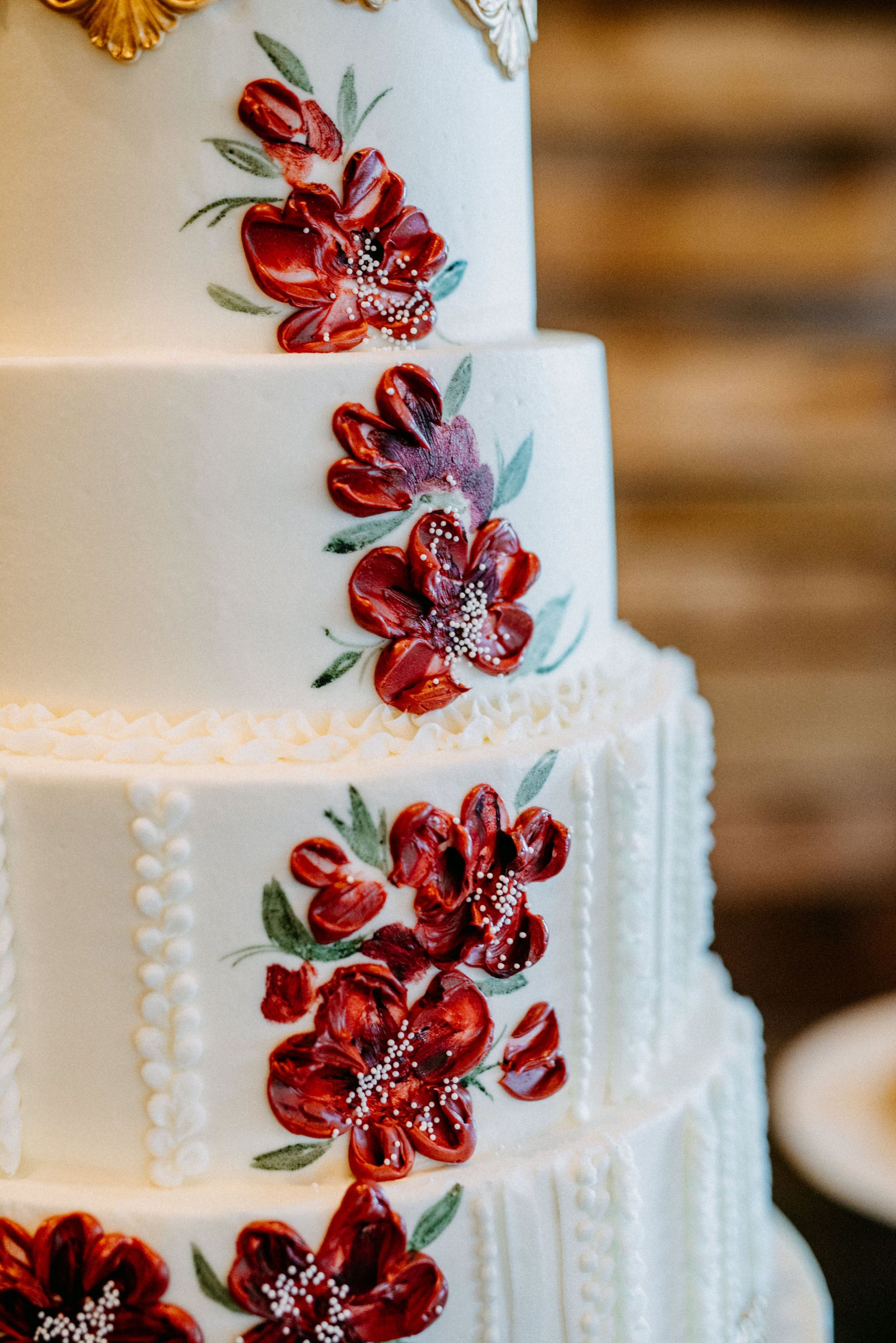 Hand Painted Red Flowers On White Wedding Cake