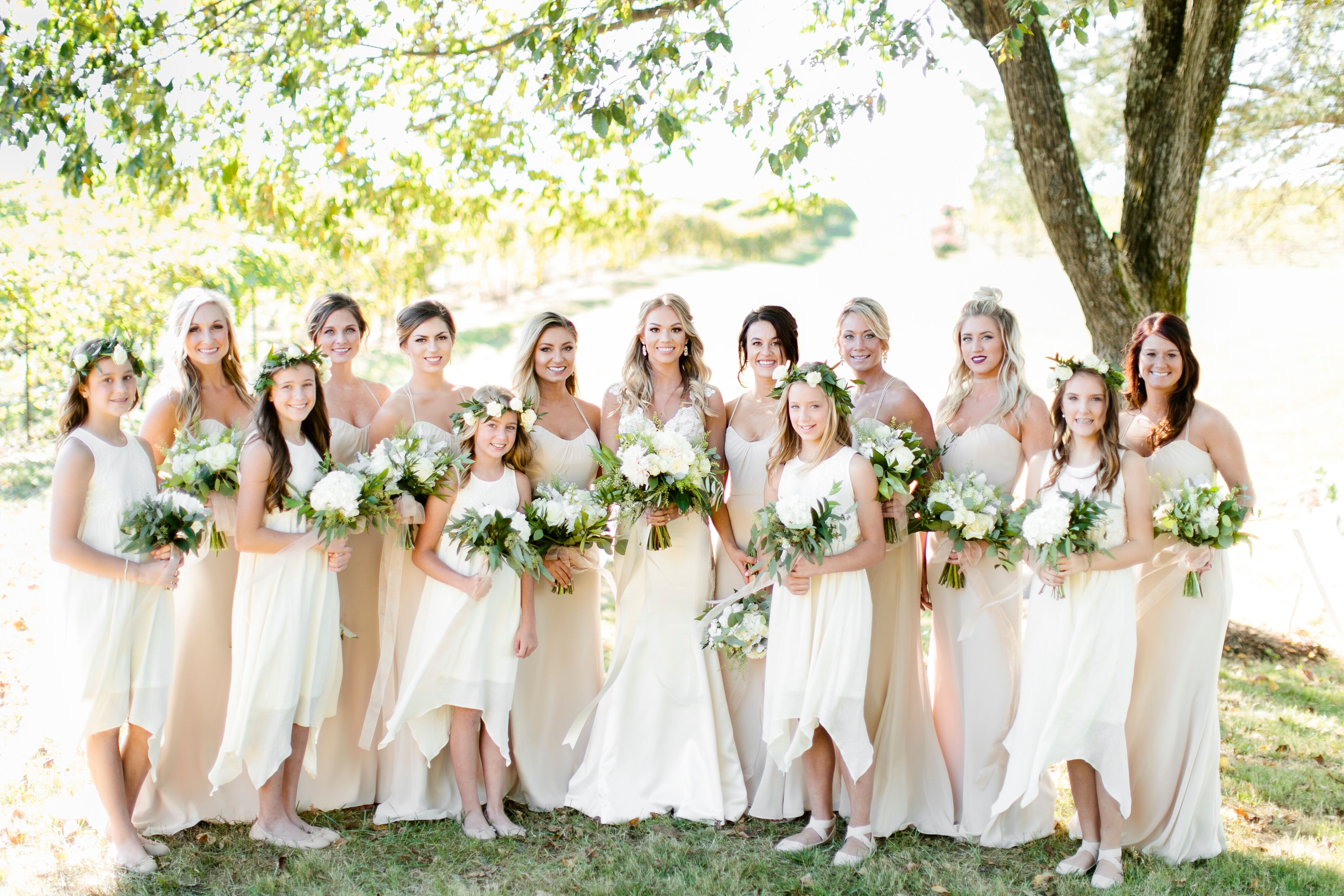 Bridesmaids in Ivory Gowns and Flower Girls with Eucalyptus Flower Crowns