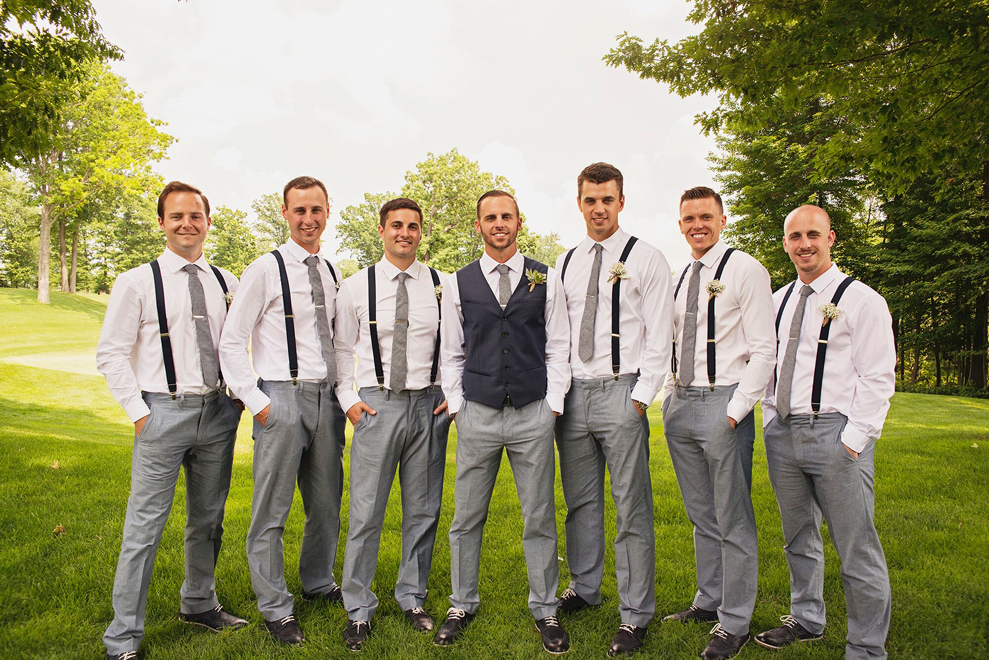 Groomsmen wearing outlet suspenders