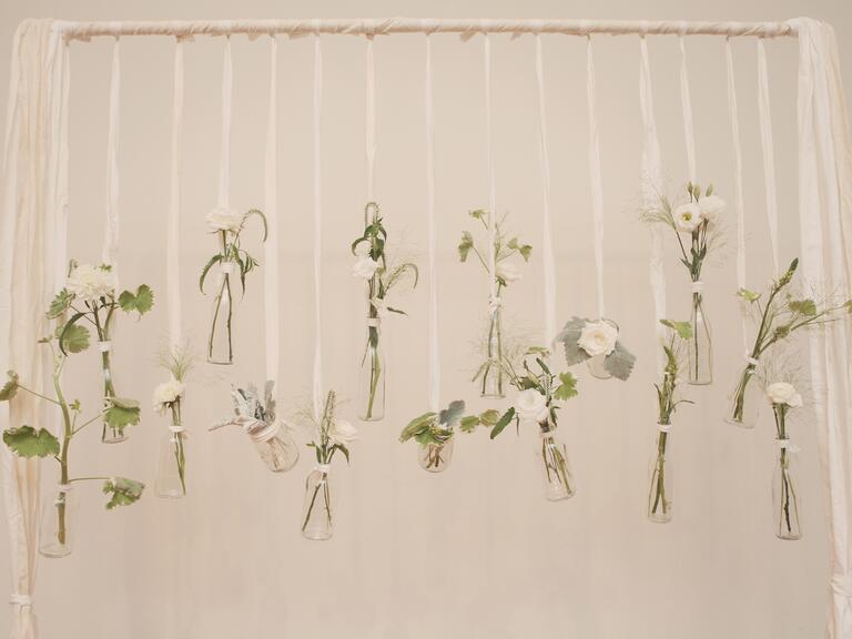 Hanging vase wedding ceremony backdrop