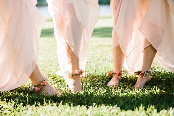 Barefoot bridesmaids with floral anklets