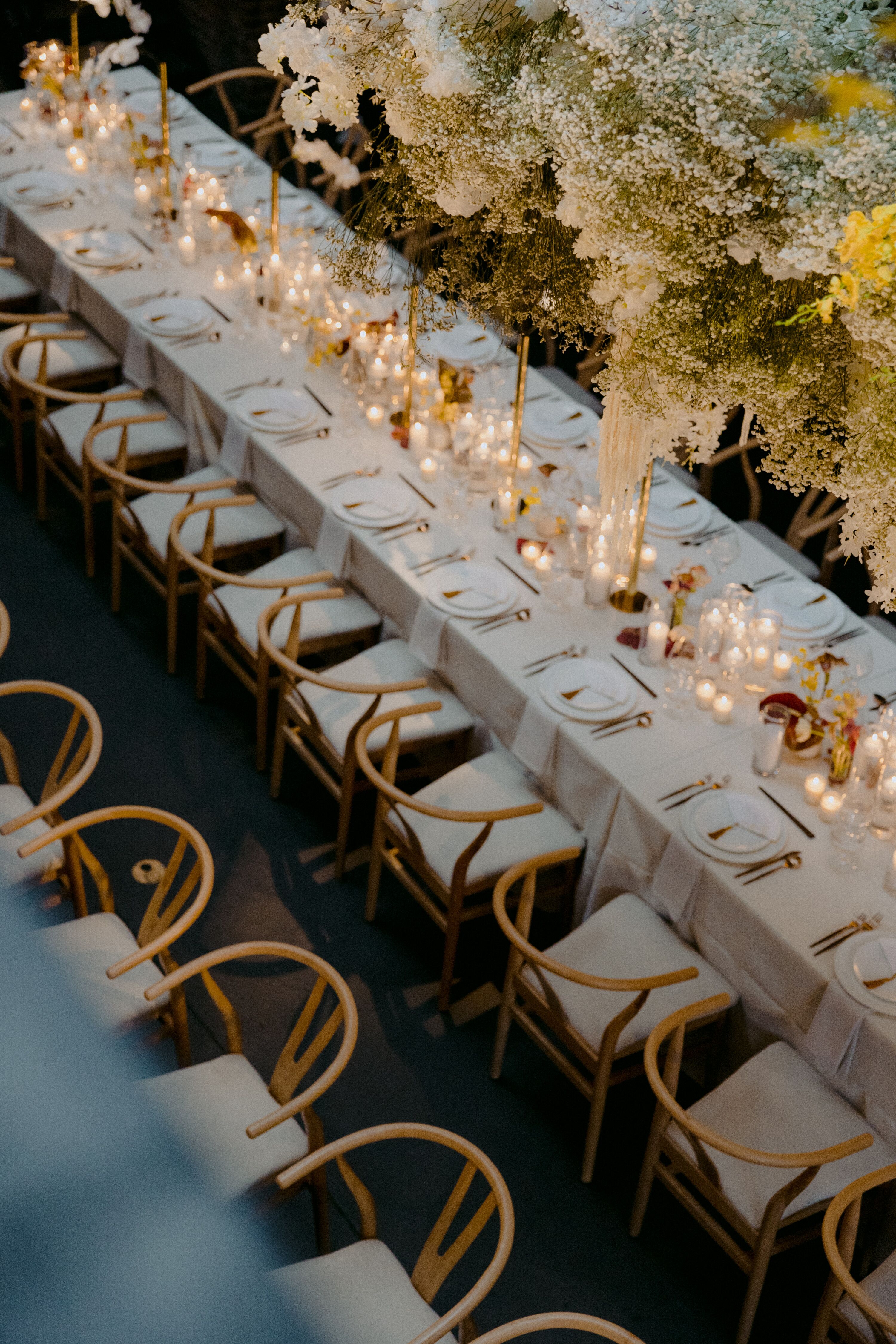 Long Reception Tables With Neutral Linens and Details, Many Candles ...