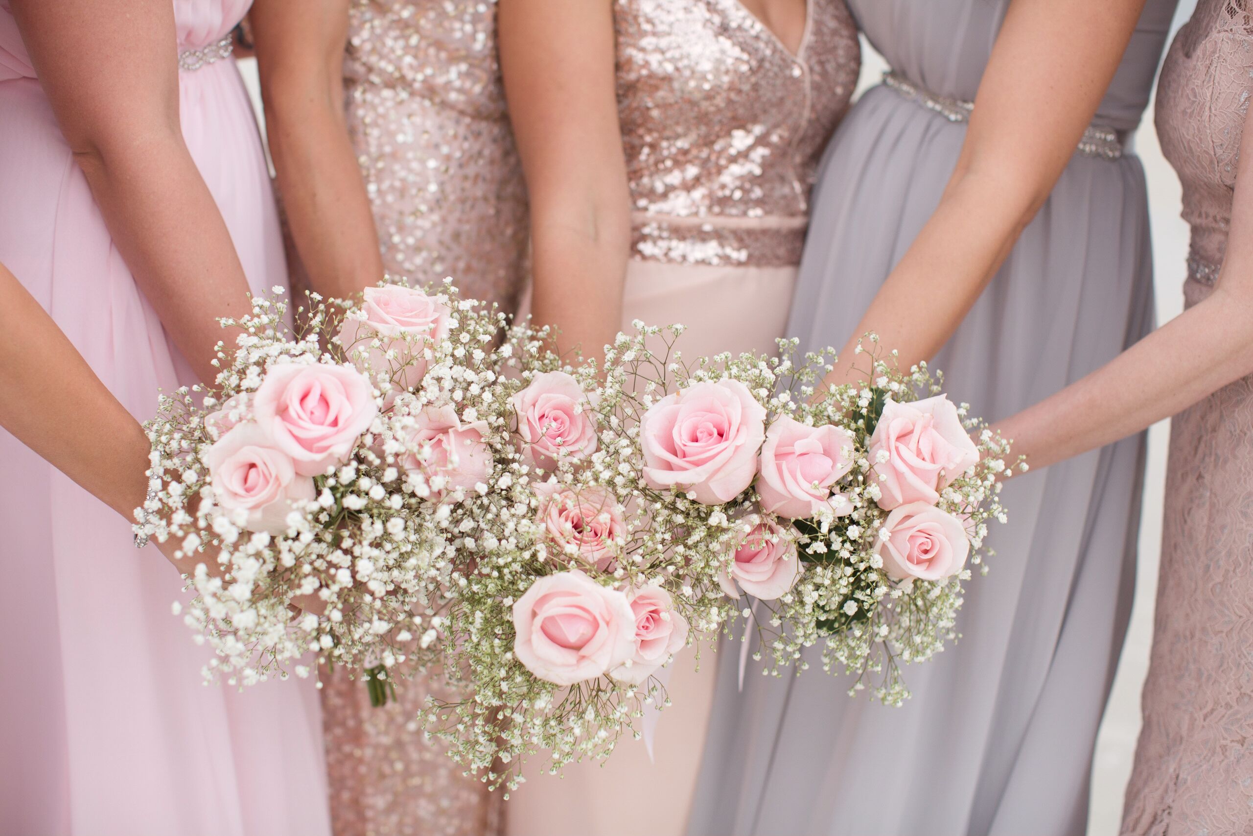 Pink Rose and Baby's Breath Bridesmaid Bouquets