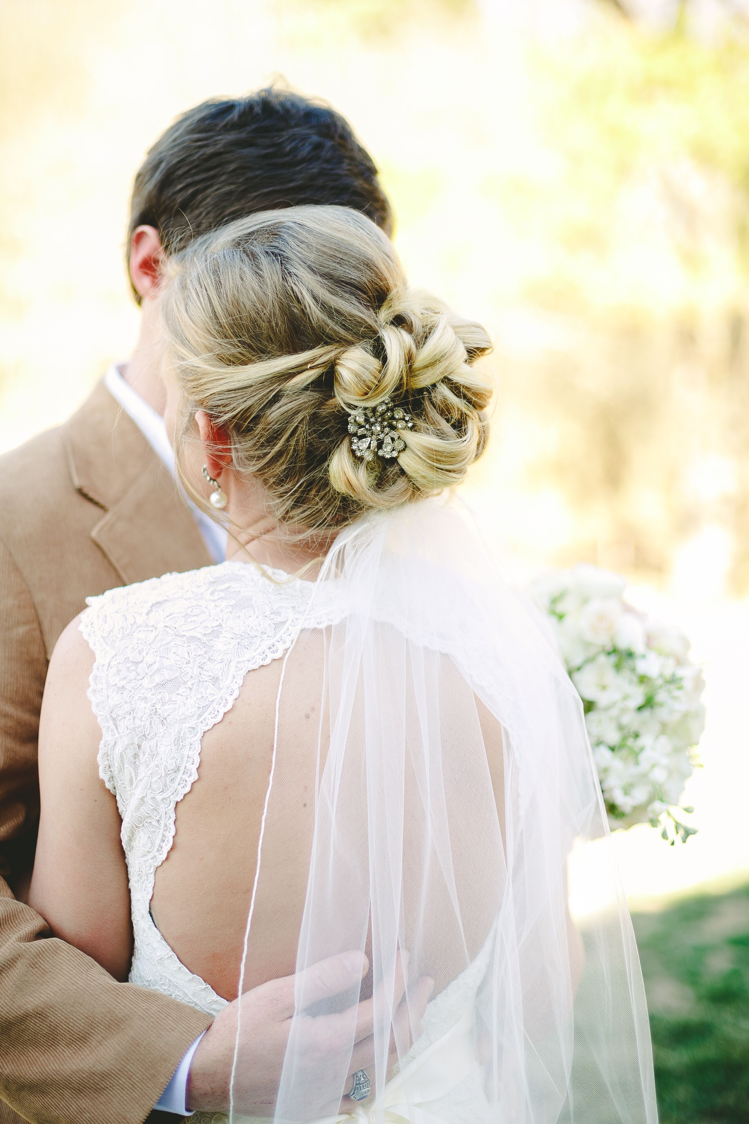 Elegant Wedding Updo With Embellished Hair Clip