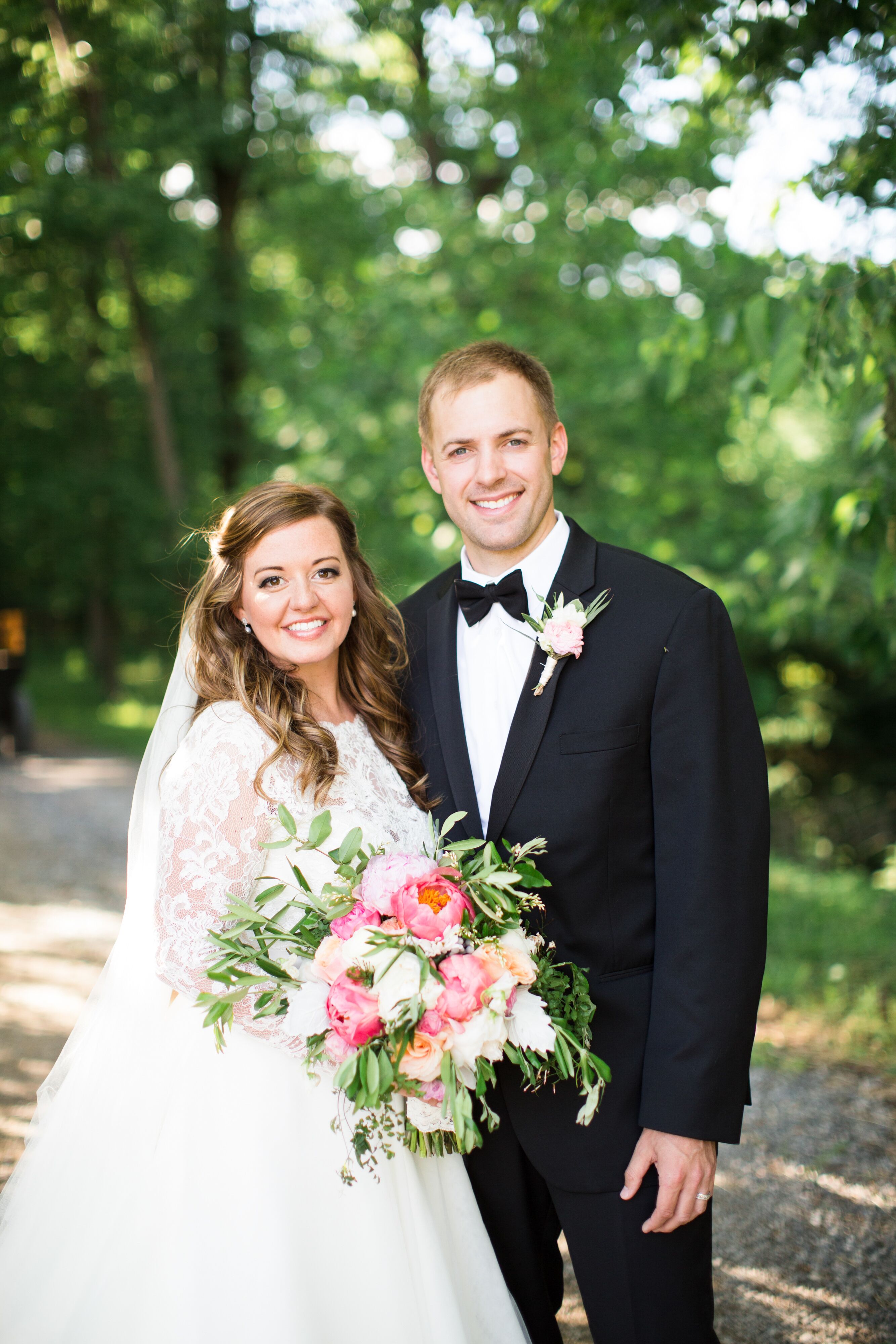 Married Couple and Colorful Bridal Bouquet