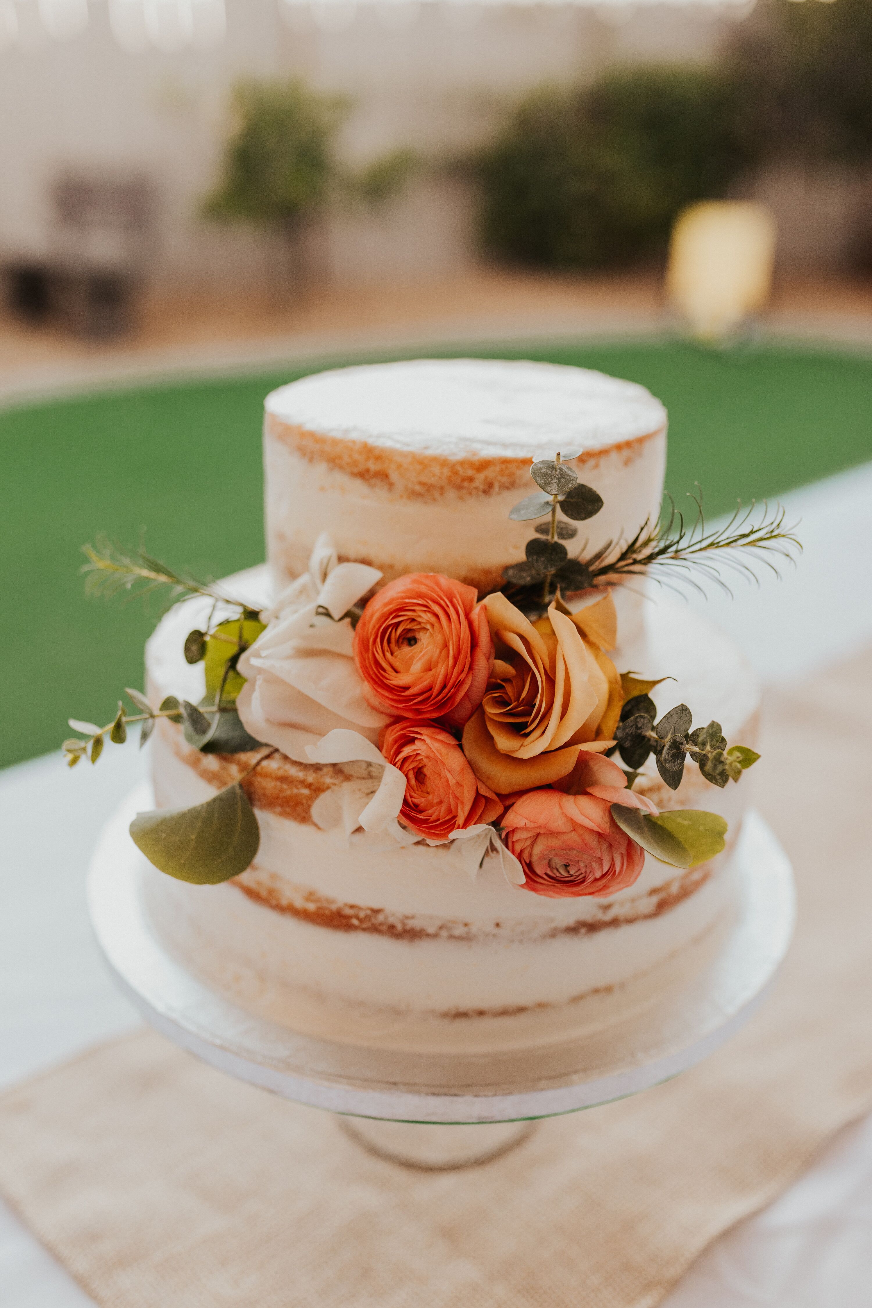 Two Tier Semi Naked Cake With Flower Accents