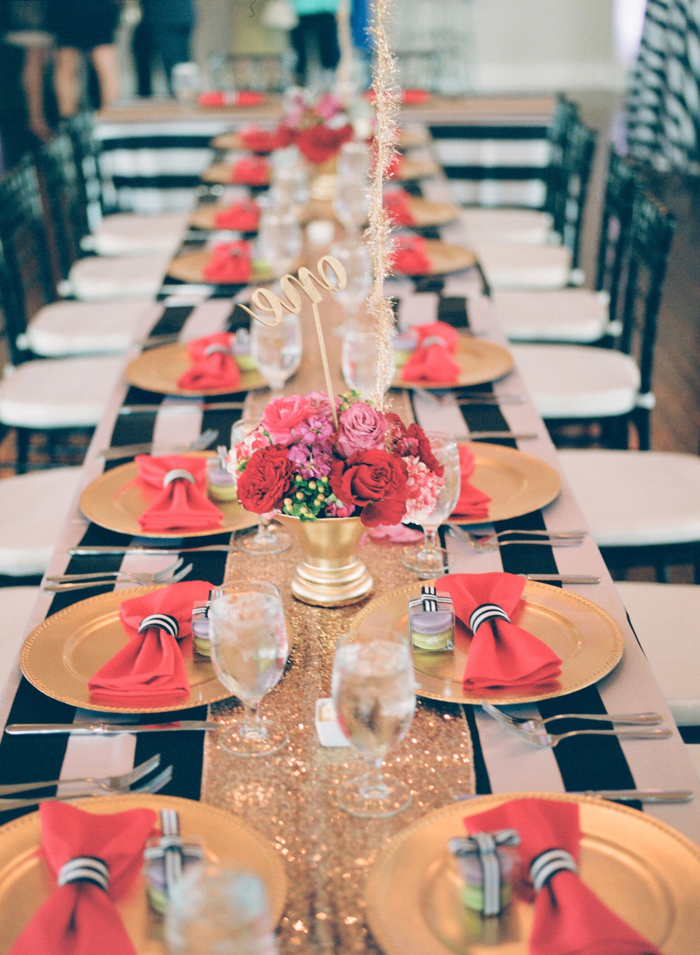 Gold Table Runners and Bright Rose Centerpieces