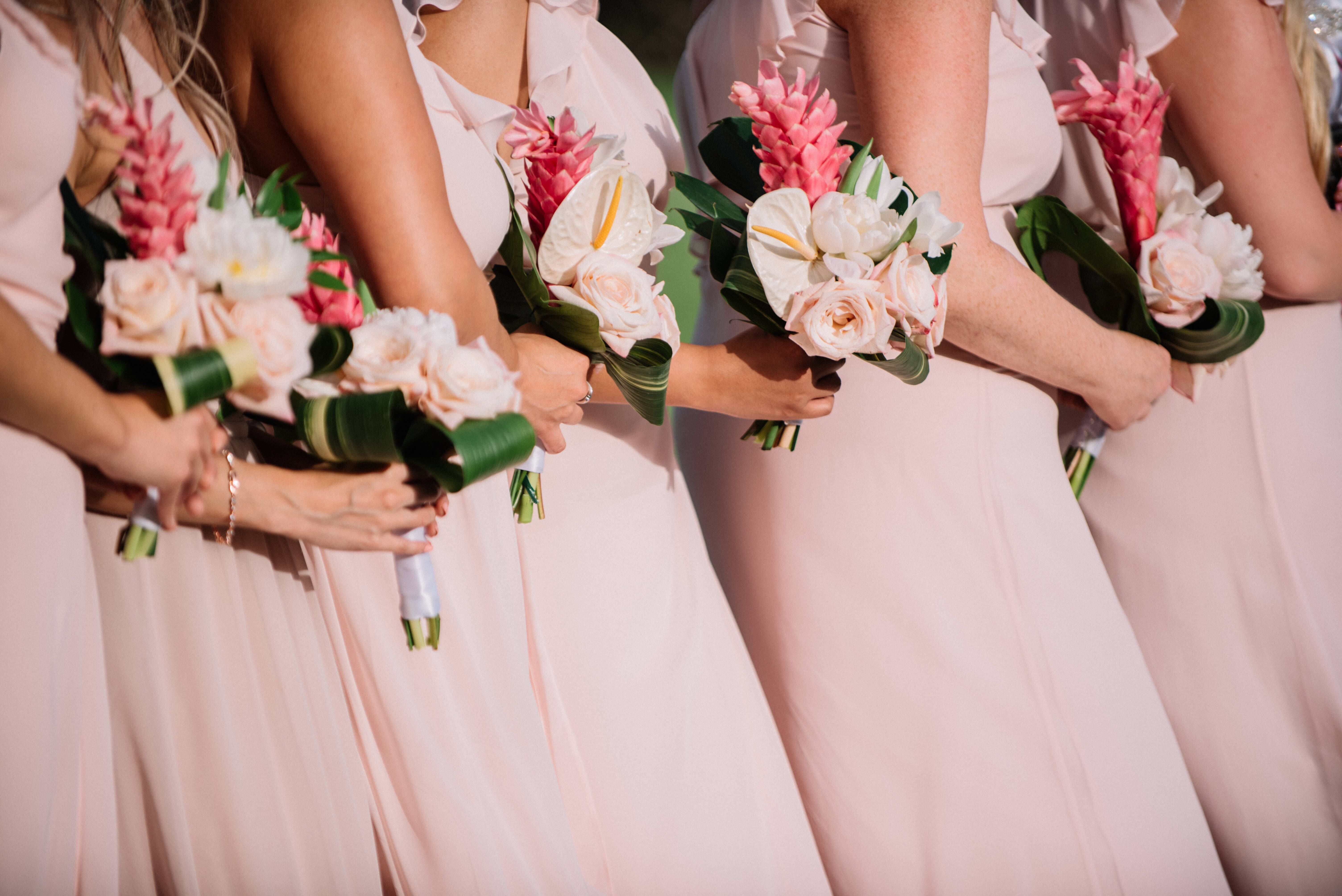 Bridesmaids With Pink Bouquets And Dresses