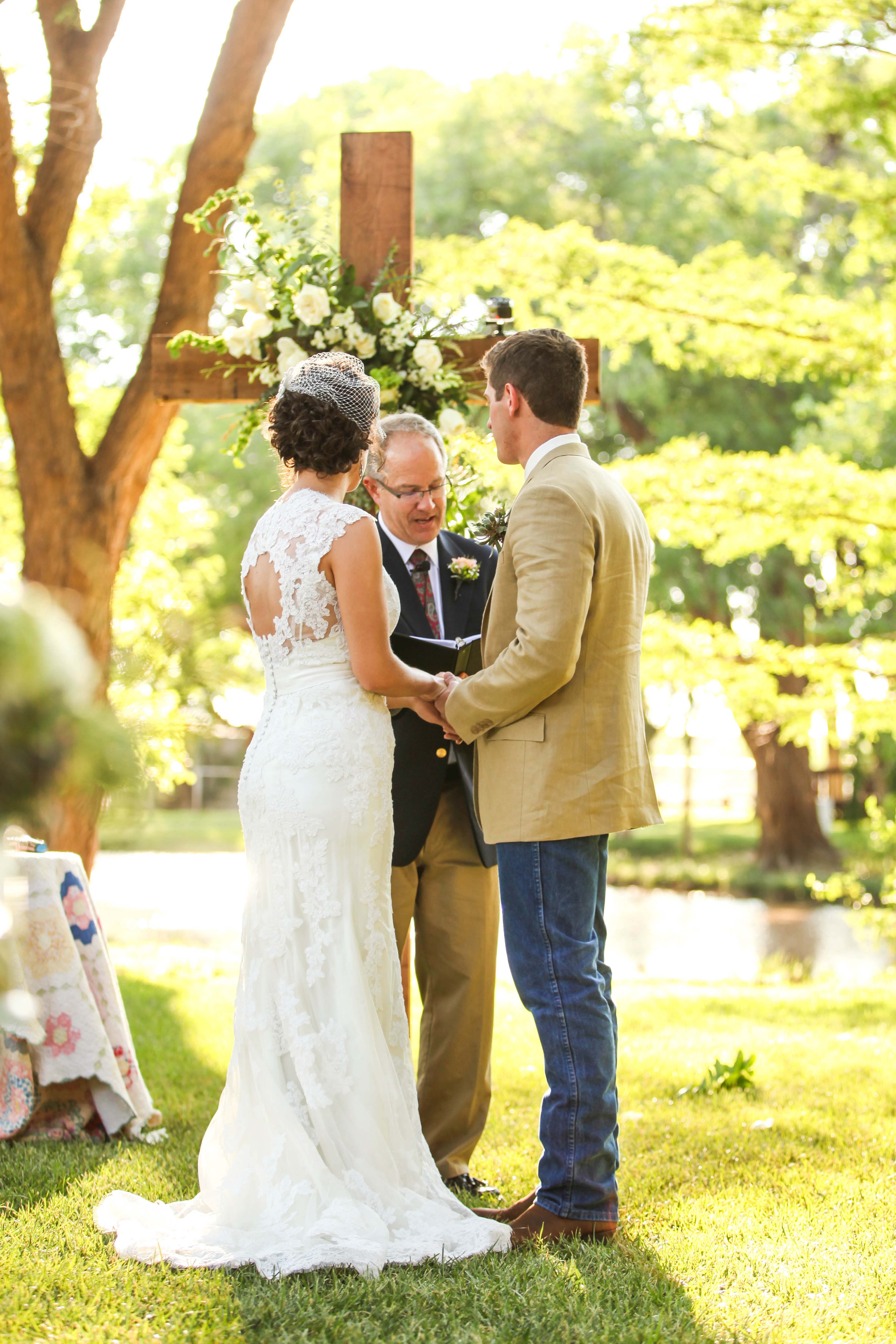 outdoor-christian-wedding-ceremony-with-floral-cross