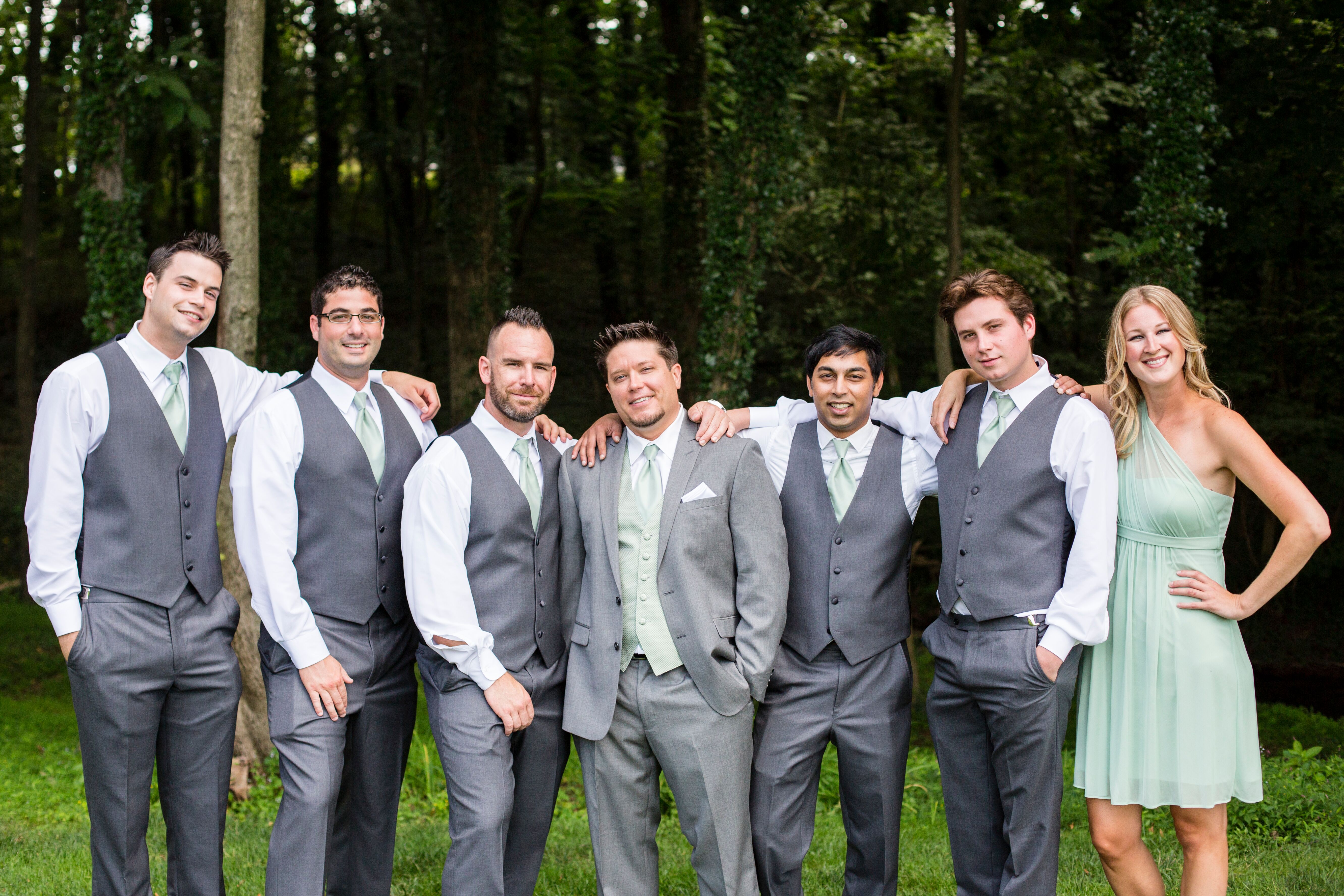 Groomsmen In Gray Pants And Vests With Pale Green Ties