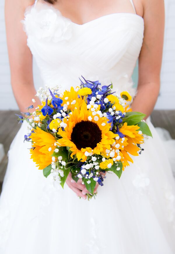 Bridesmaids in Royal Blue Cocktail Dresses with Sunflower ...