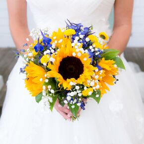 Bridesmaids in Royal Blue Cocktail Dresses with Sunflower Bouquets