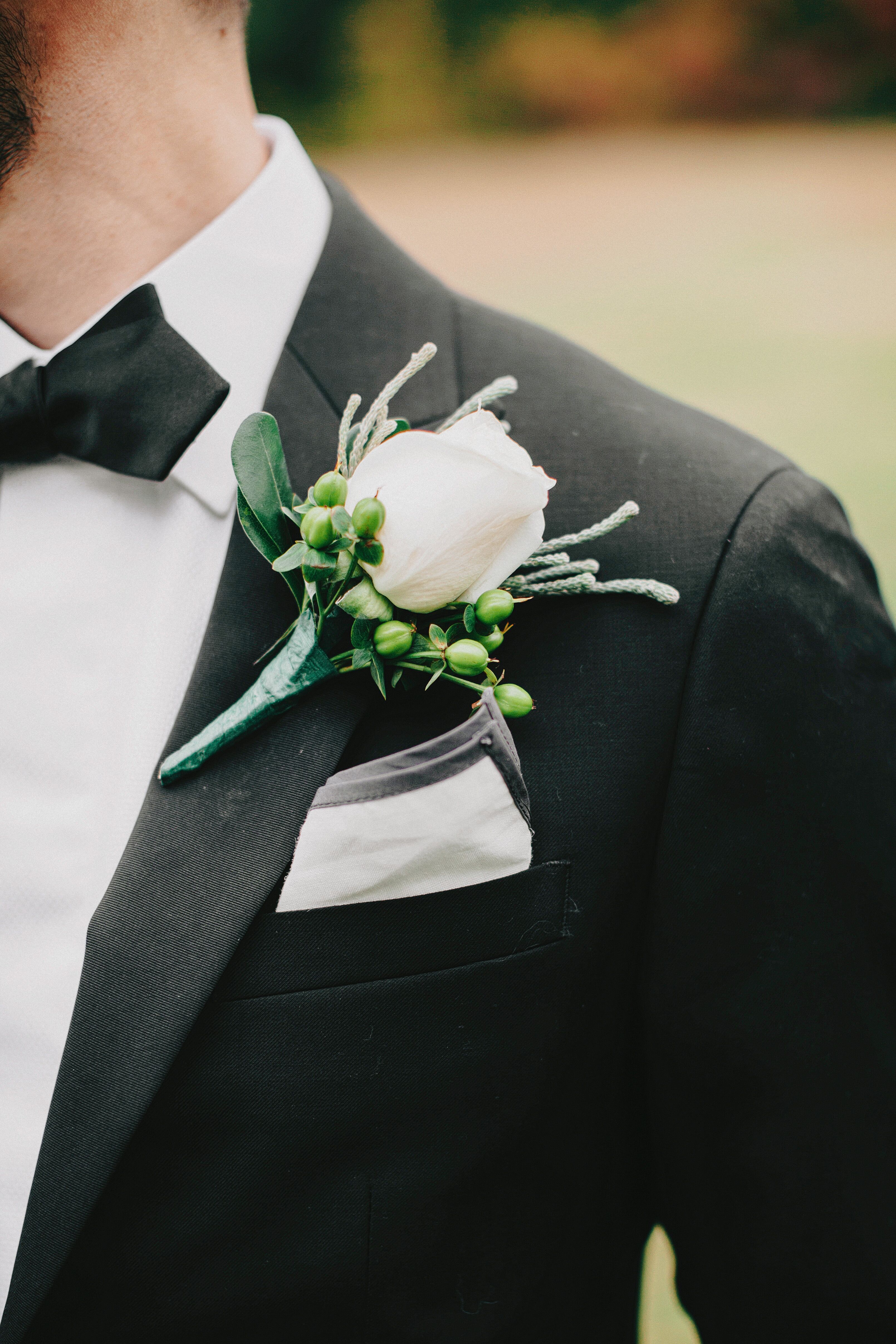 White Rose and Green Hypericum Berry Boutonniere