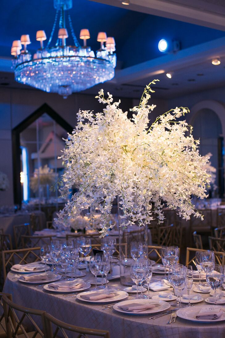 Large White Floral Centerpiece in Glass Vase