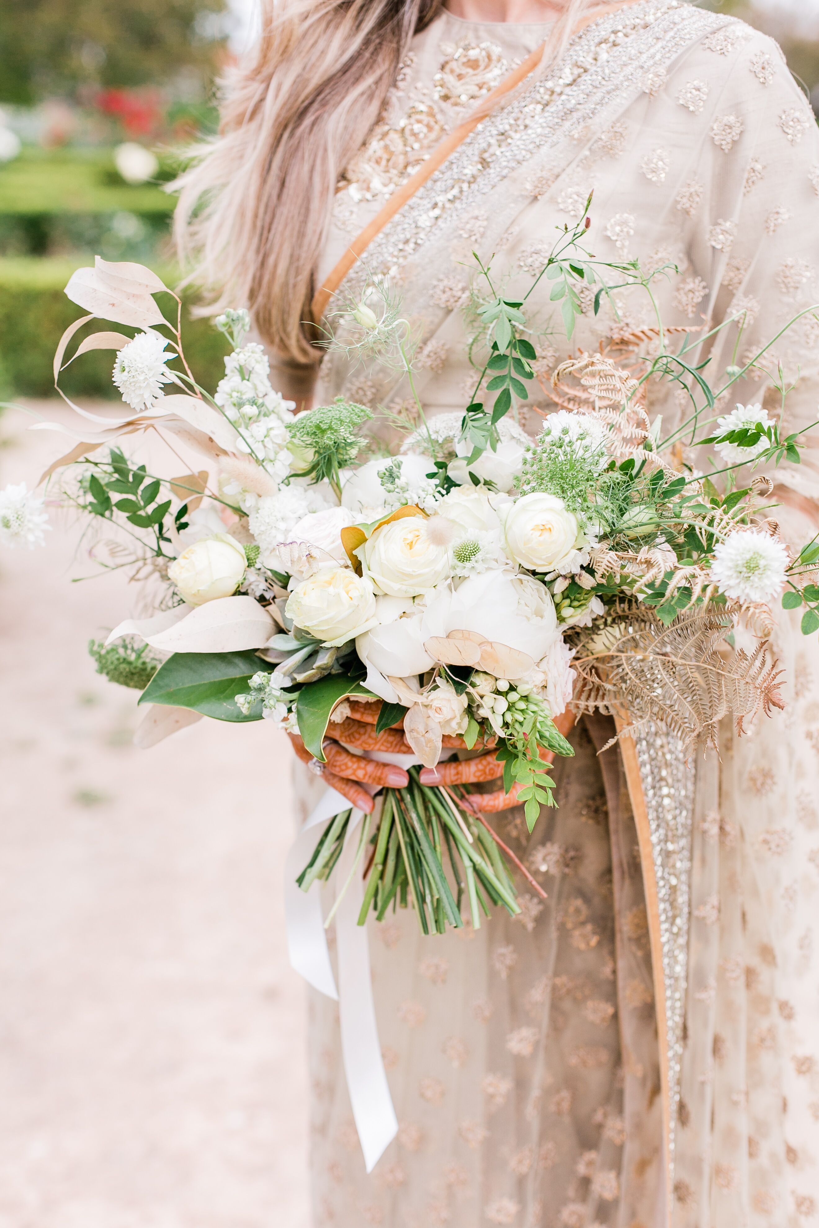 white roses and greenery bouquet