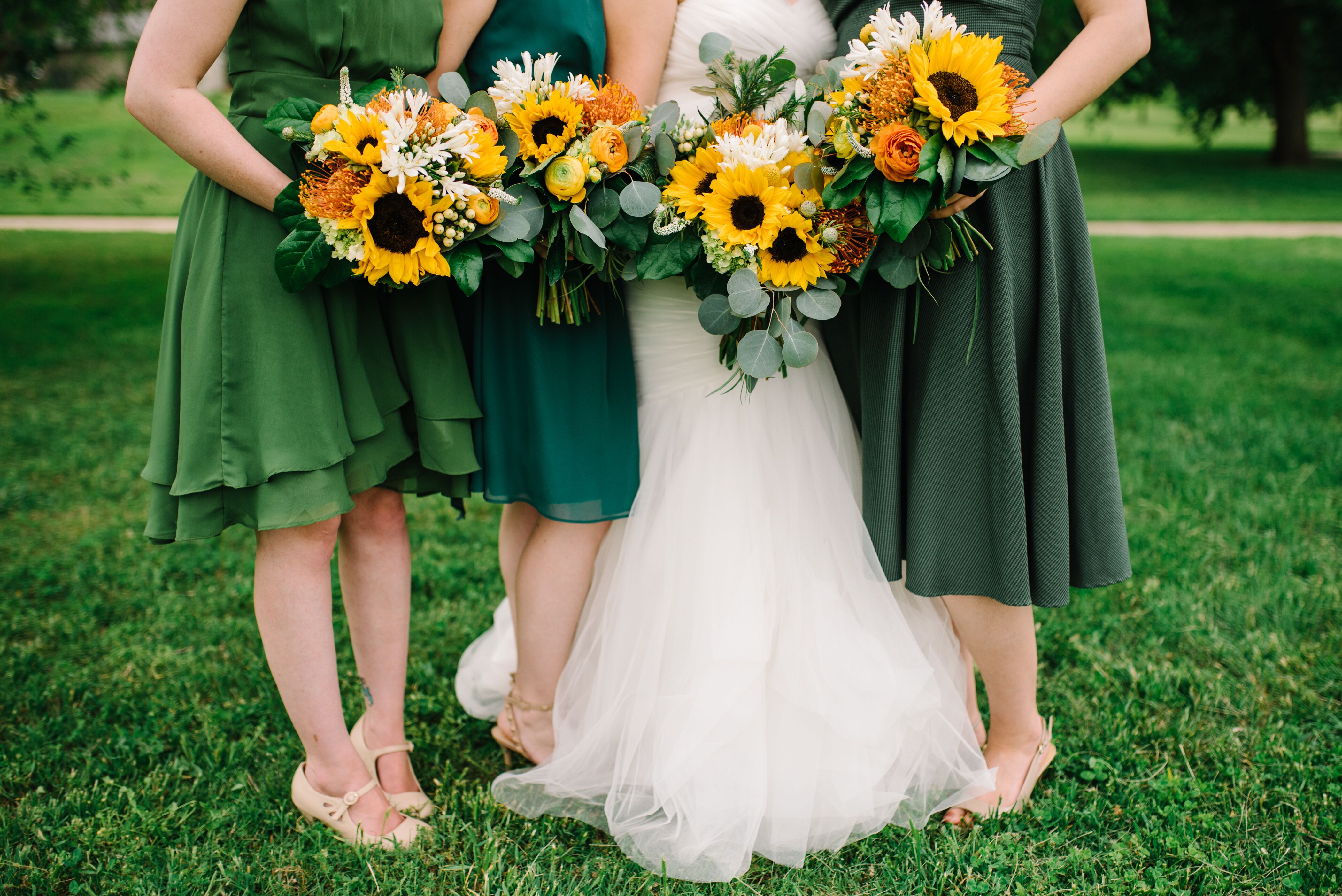 Bridesmaids in Green with Sunflower Bouquets