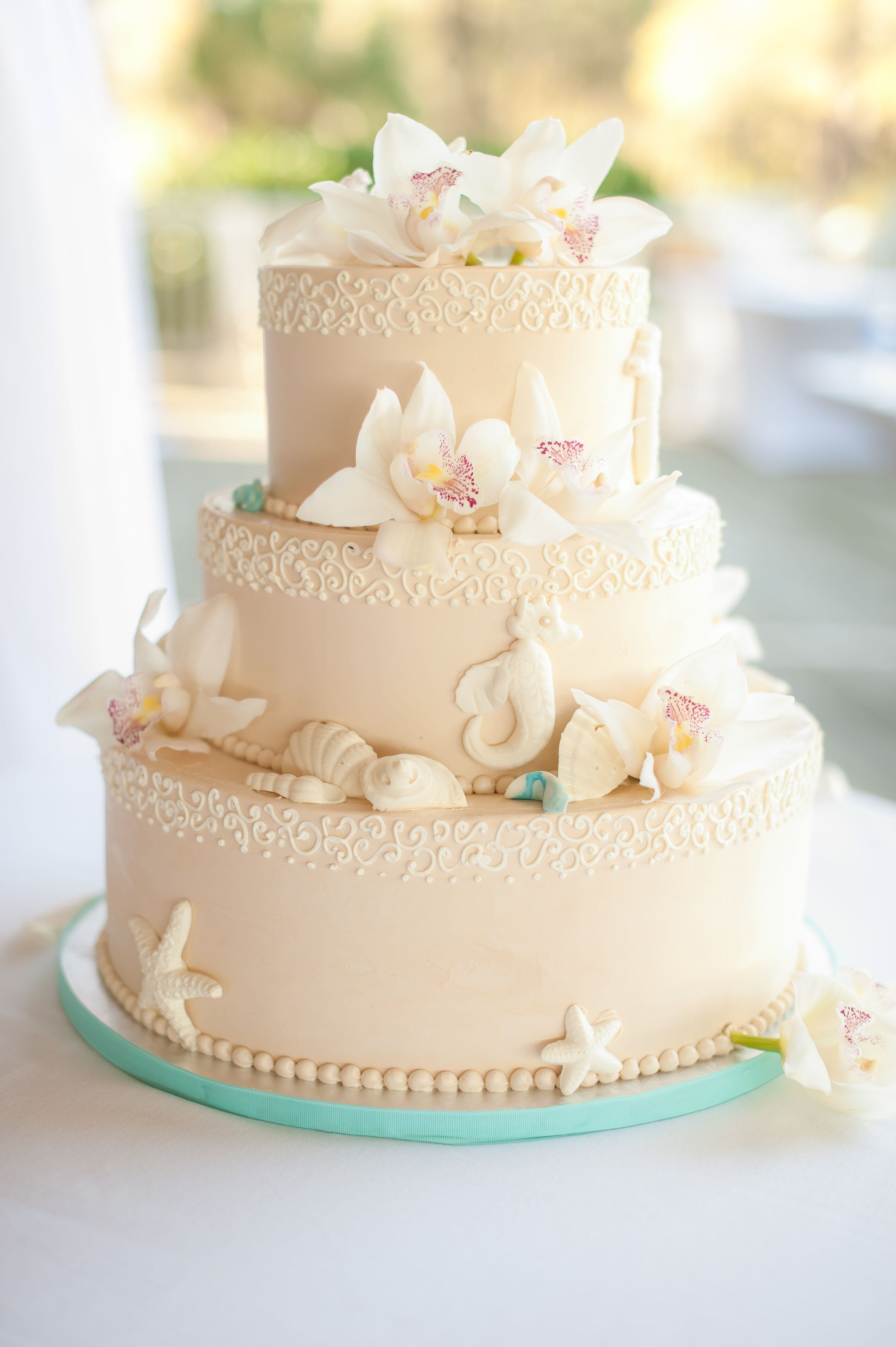 Beach Themed Wedding Cake with Seashells and Seahorses